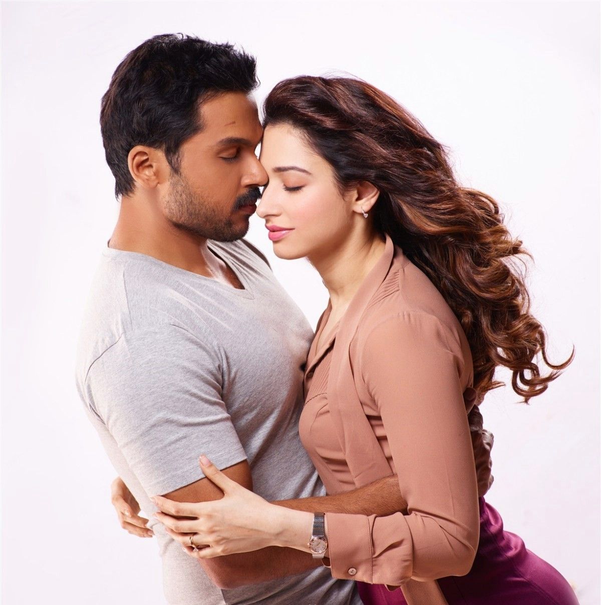 Picture Gallery Of Actor Karthi And Tamannah Hot Stills In Movie Thozha