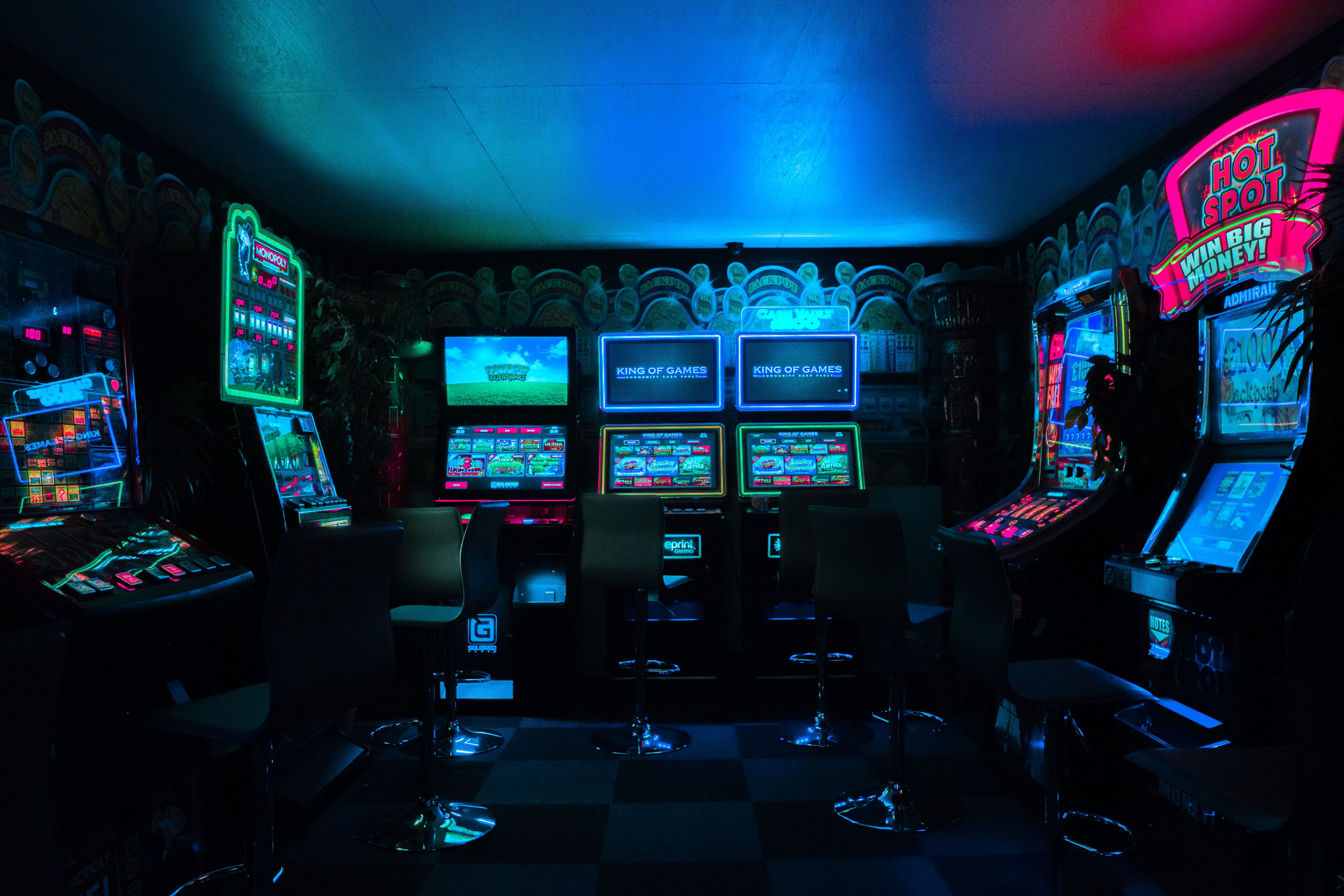 gaming room with arcade machines, video arcade shop interior #game #machine #neon #lights #arcade K #wallpaper #hdwallpaper #desk. Arcade, Arcade machine, Games