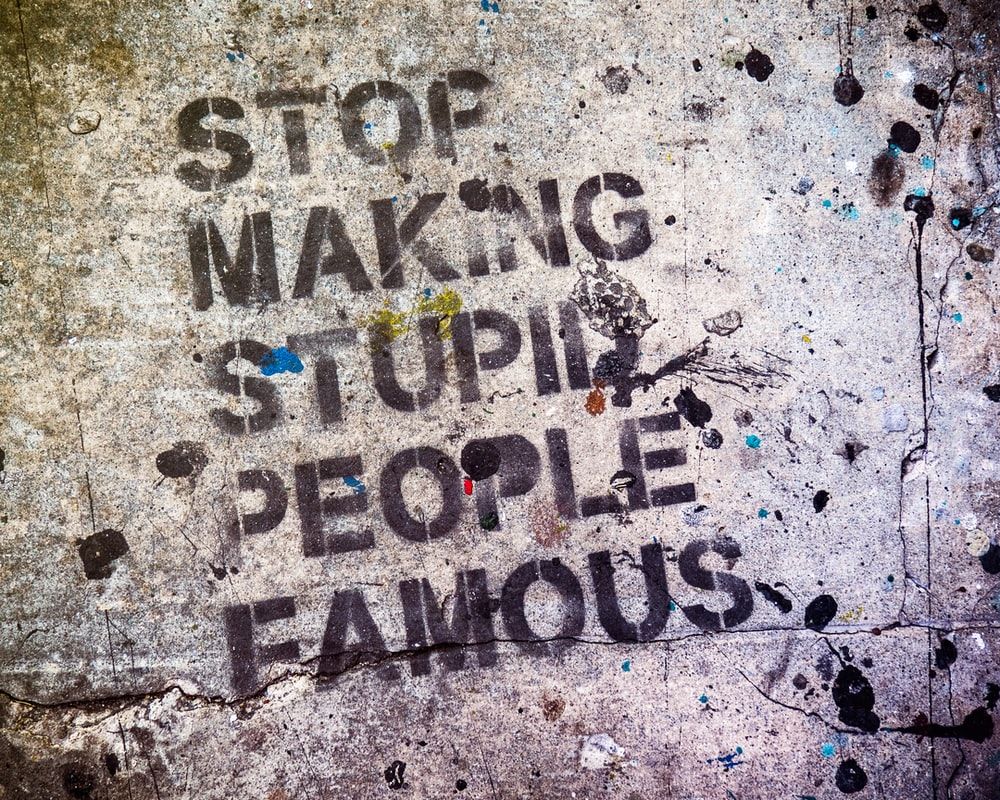 stop making stupid people famous text photo