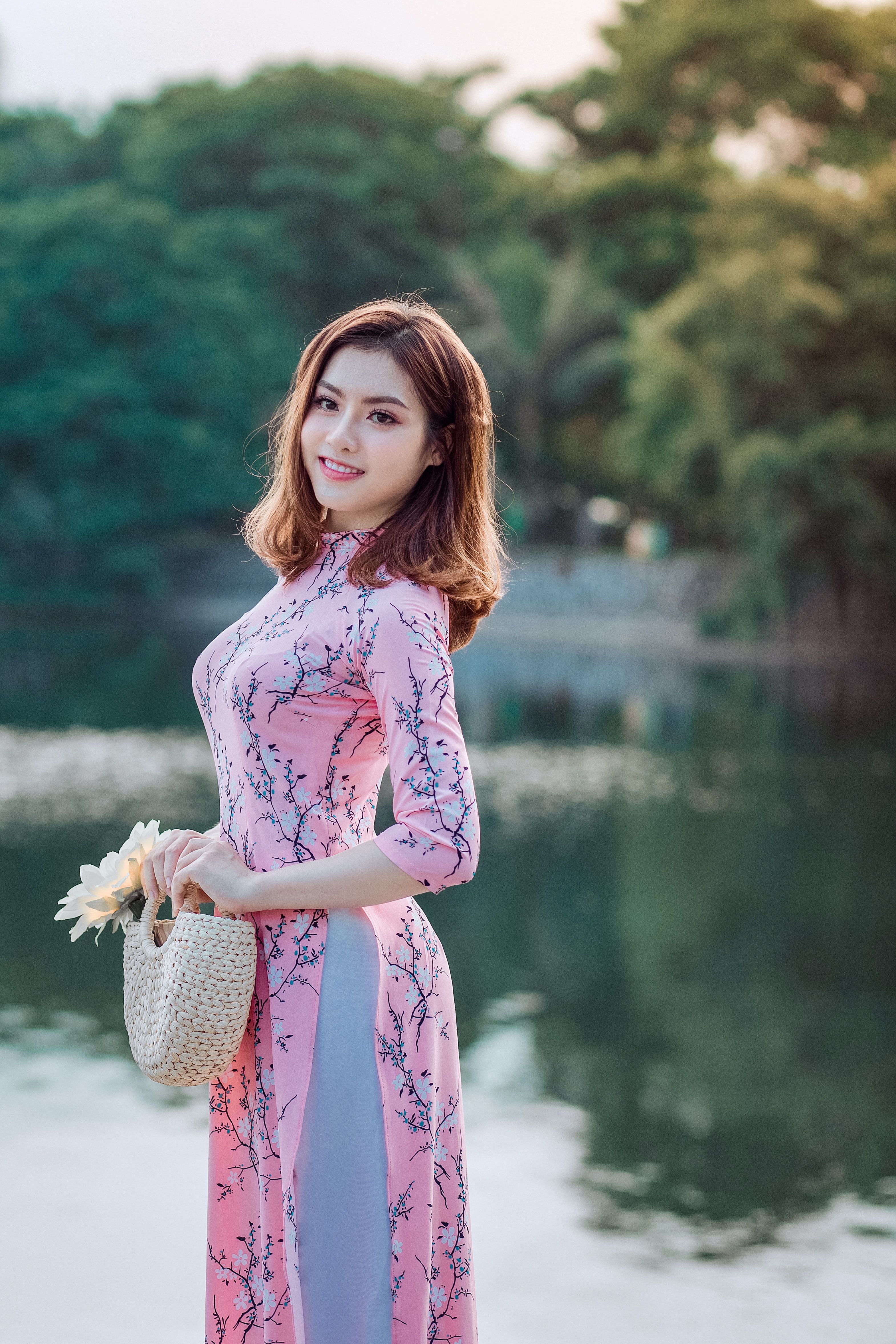 Woman Standing and Doing Pose Beside Lake · Free