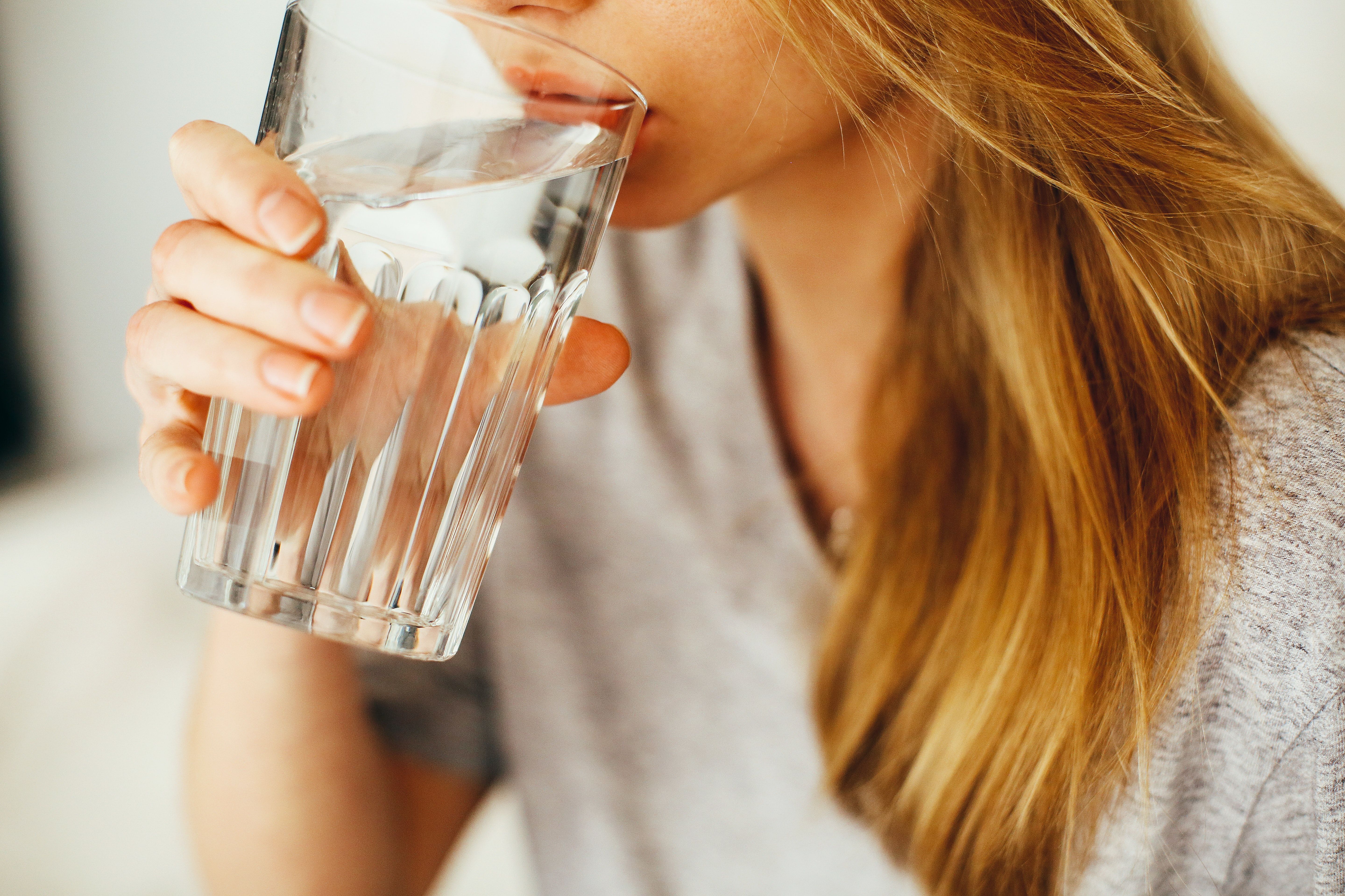 Woman Drinking Water · Free