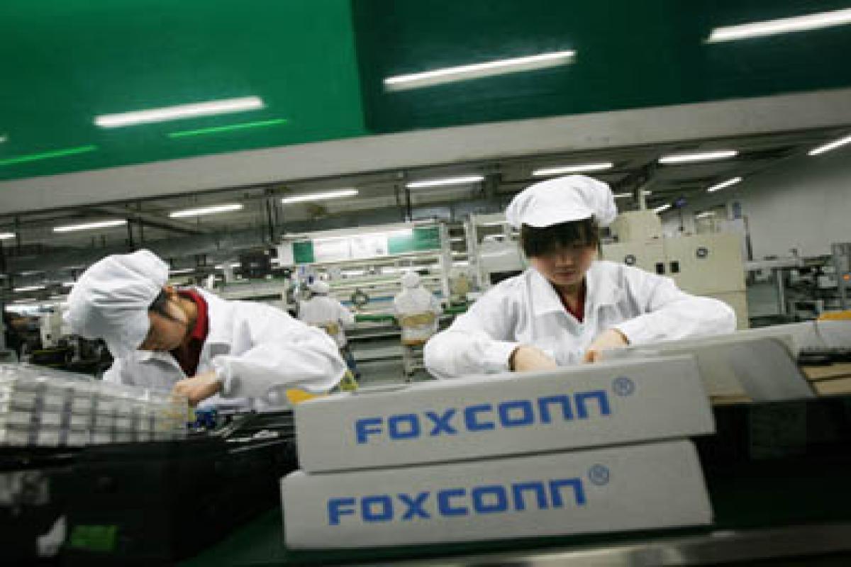 Foxconn chairman pledges to keep raising pay- Technology News, Firstpost