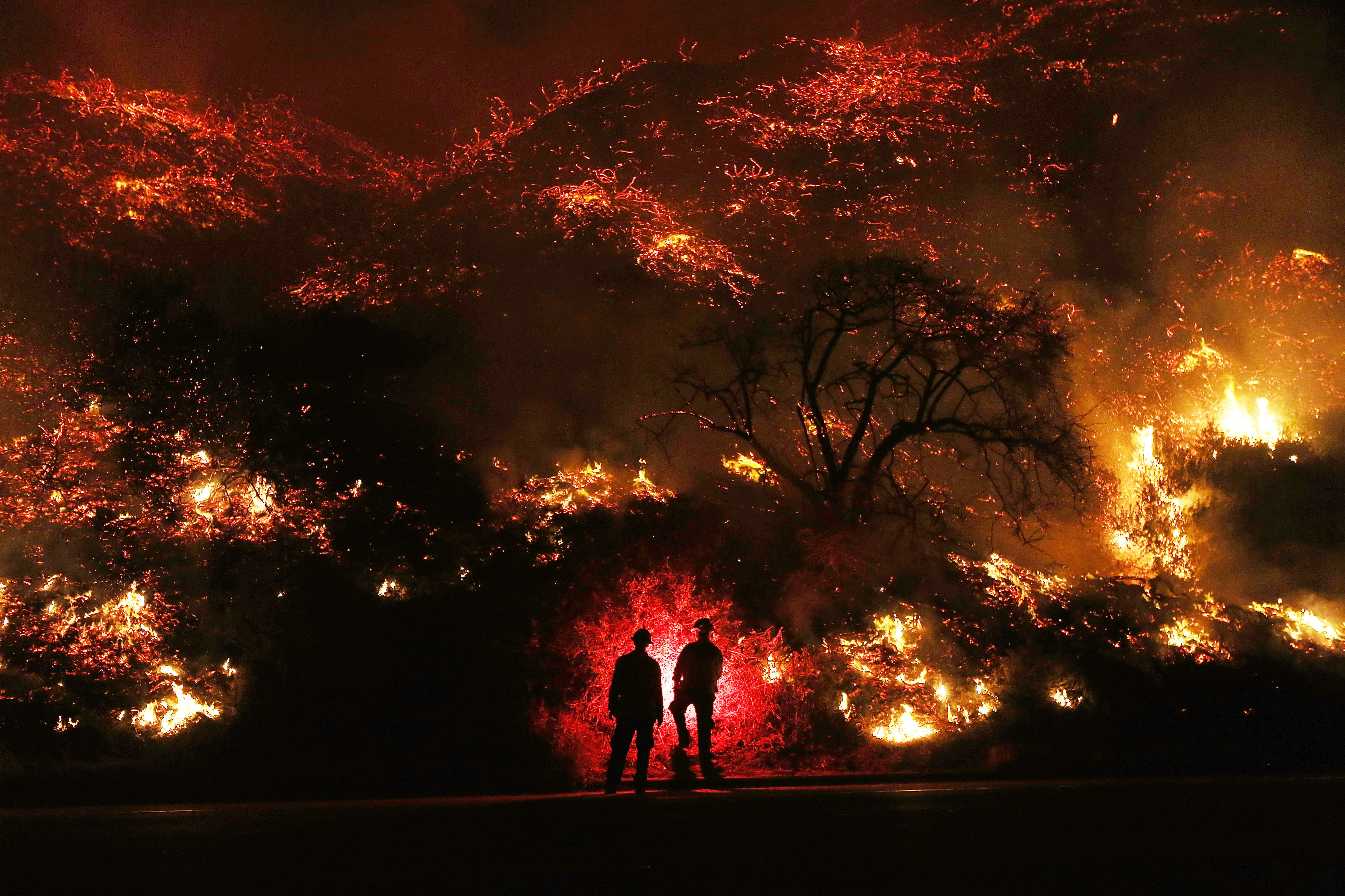 Wallpaper 4k Two Man Standing In Front Of Forest Fire