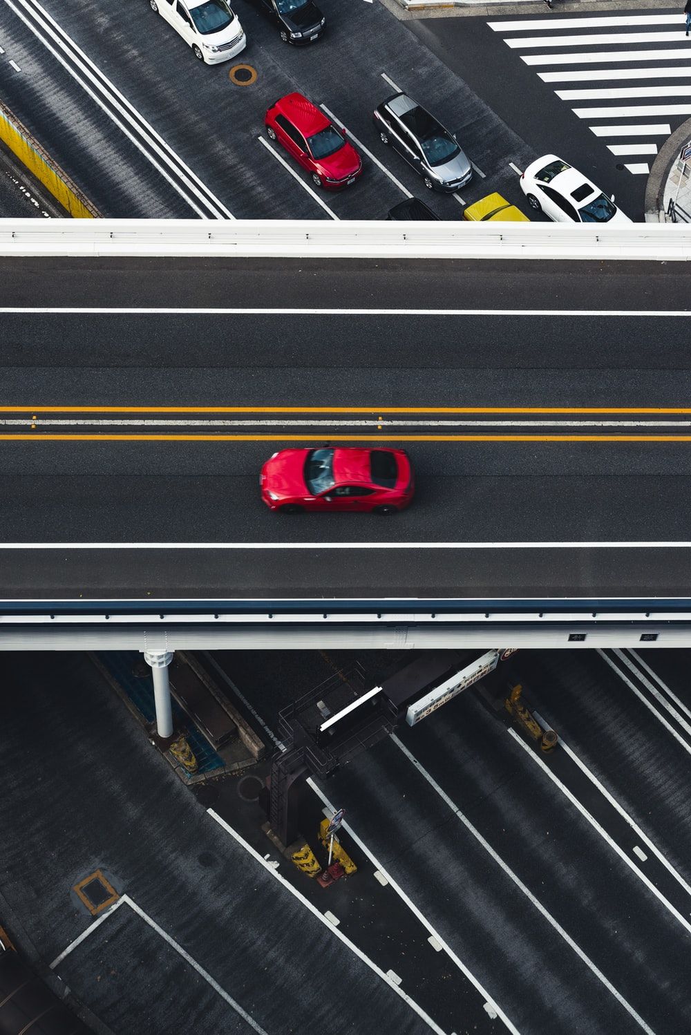 red car on super highway aerial photography photo