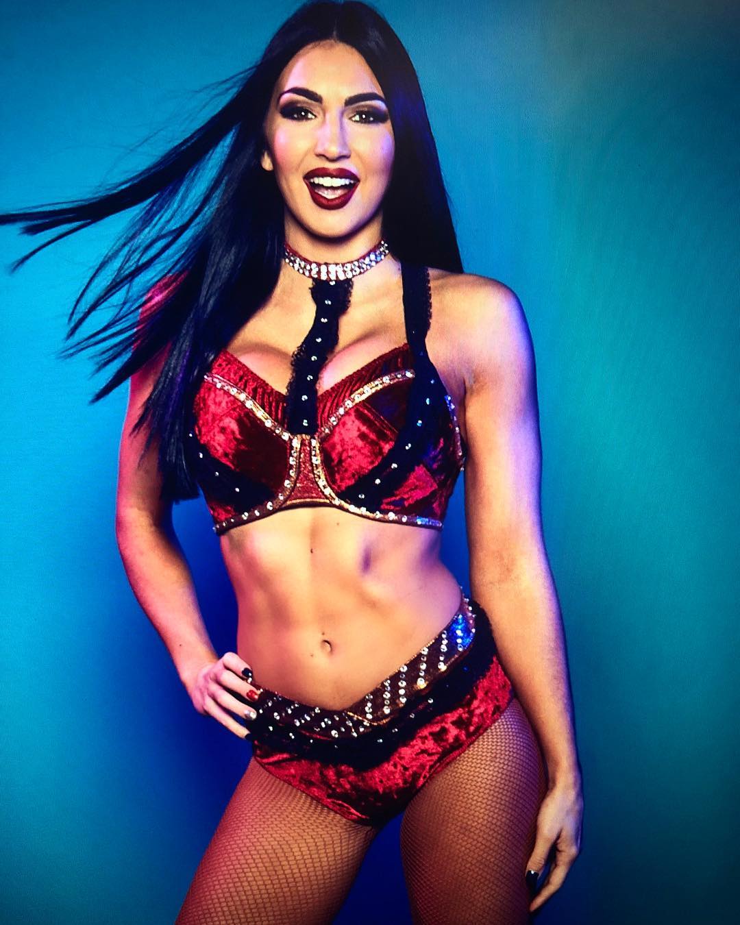 The Beautiful Billie Kay in a Hot Pose. WWE Diva Billie Kay's Hourglass Figure Is a Thing of Beauty. Events Photo Gallery. India.com Photogallery