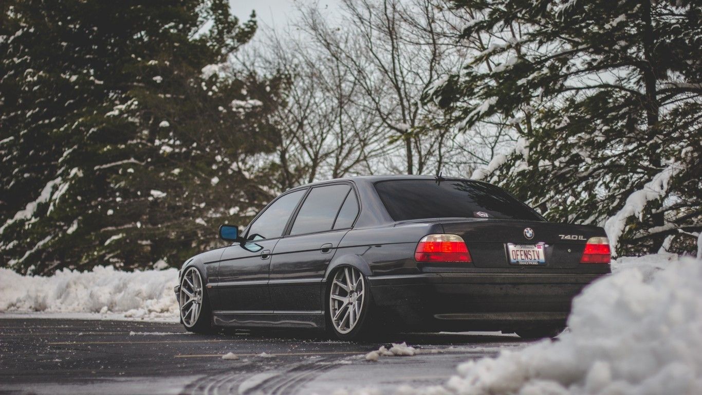 Download 1366x768 Bmw E Snow, Trees, Tuning, Black Cars Wallpaper for Laptop, Notebook