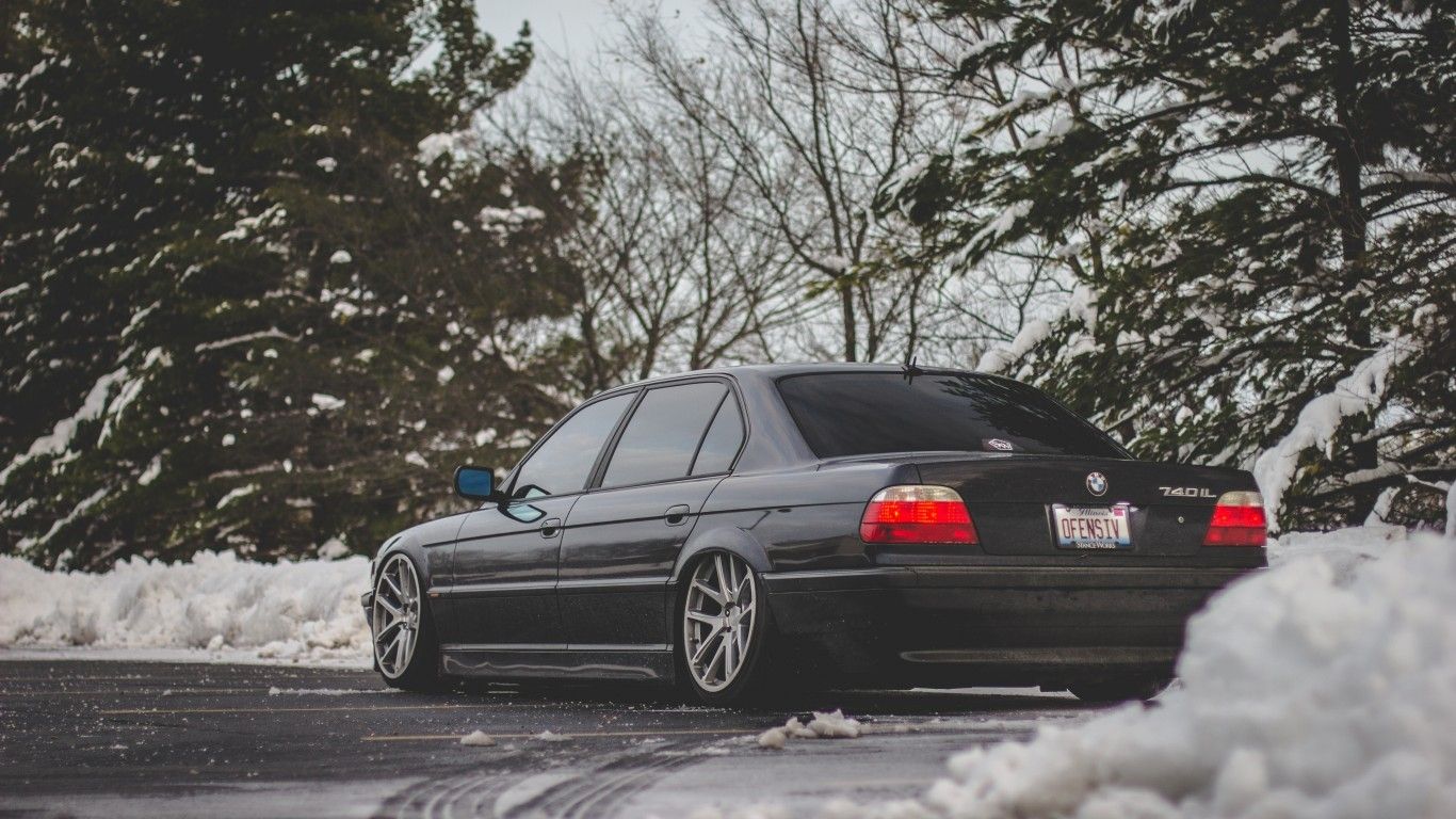 Download 1366x768 Bmw E38, Snow, Trees, Tuning, Black Cars Wallpaper for Laptop, Notebook
