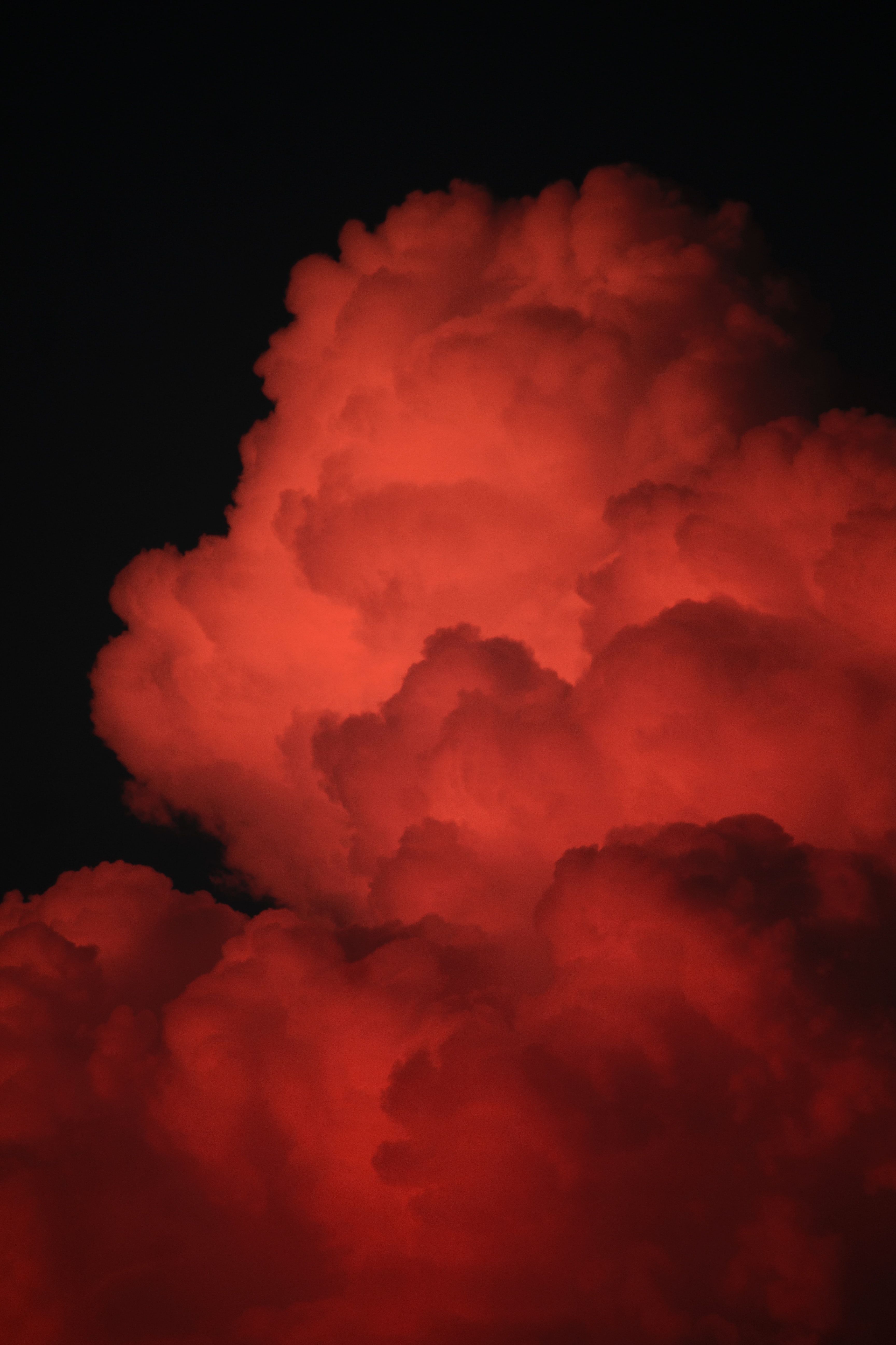 red clouds on dark sky photo