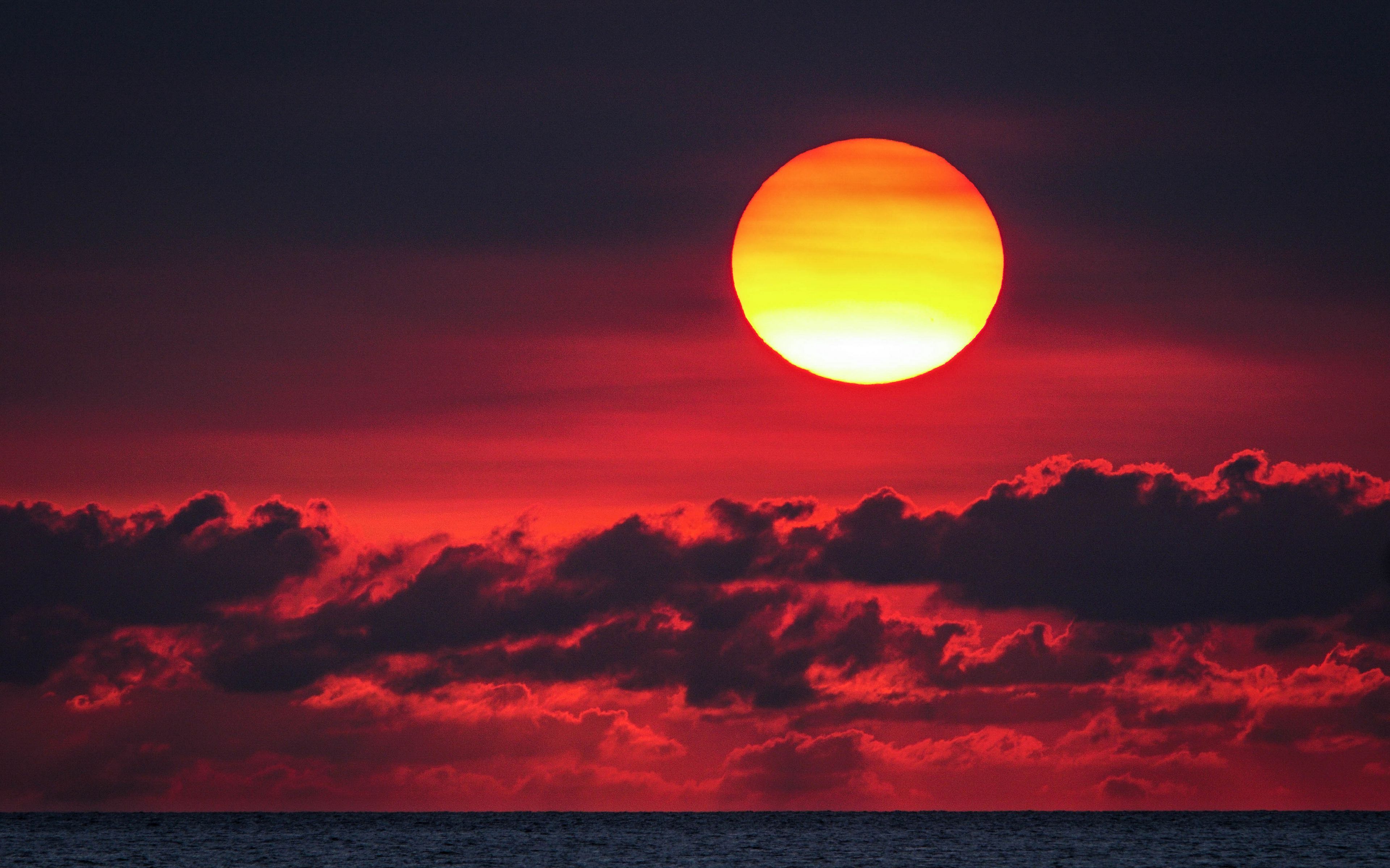 Download wallpaper 3840x2400 sunset, sun, red, clouds, sea 4k ultra HD 16:10 HD background