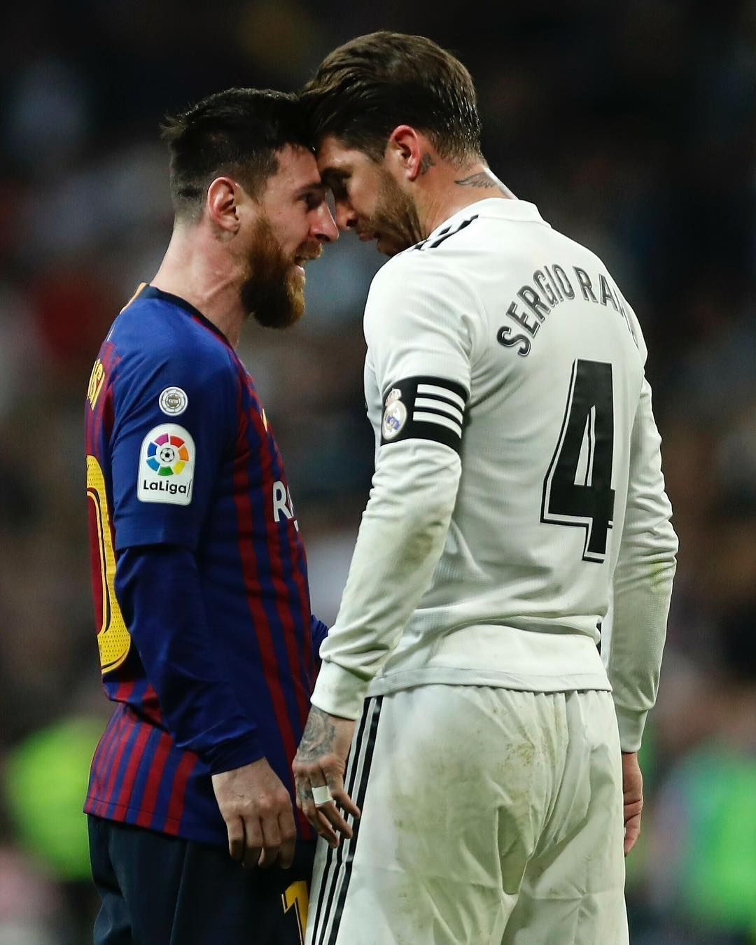 Messi & Ramos squaring up. Messi has a lot of balls