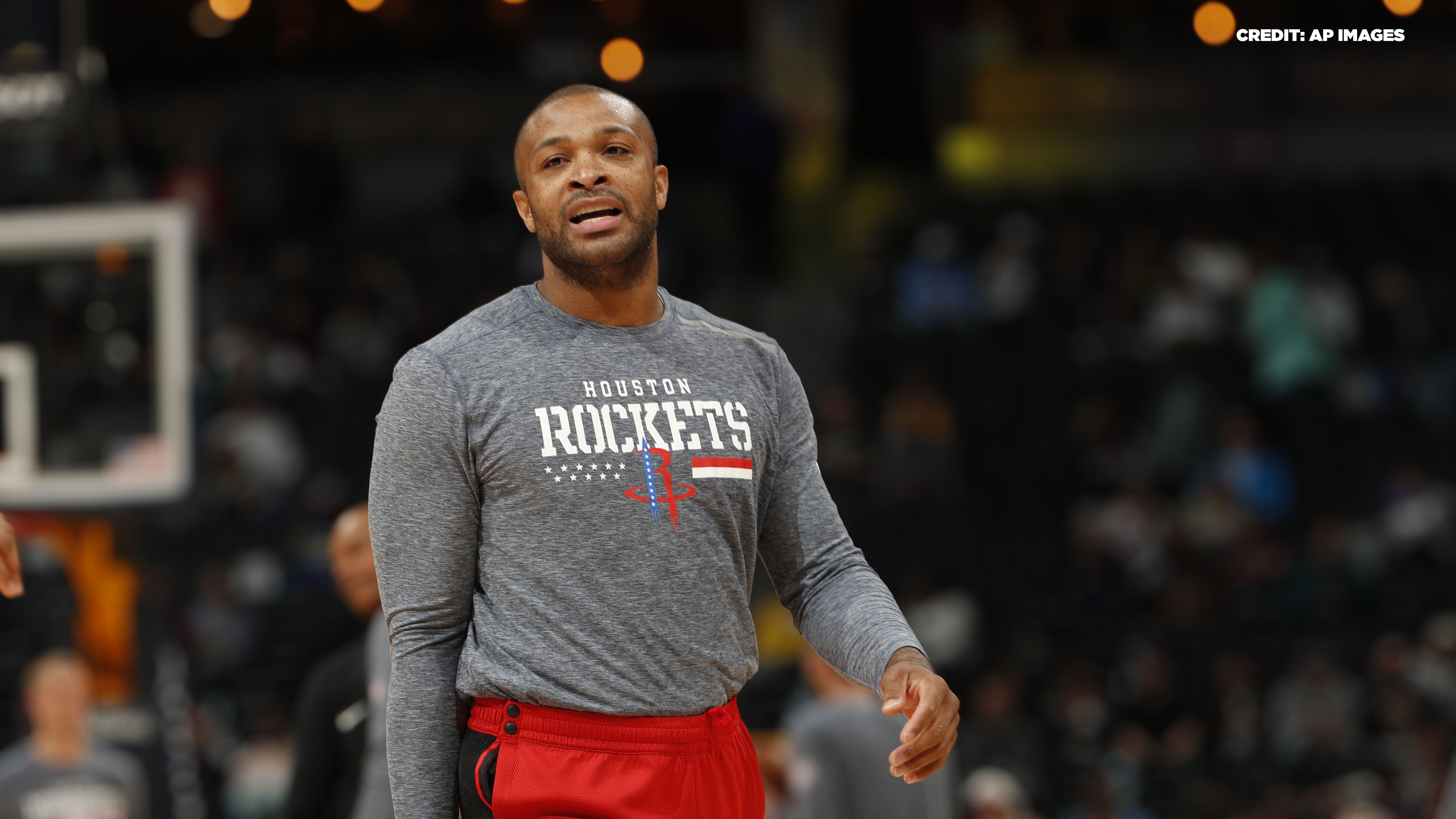 P.J. Tucker gives away pair of shoes to lucky fan in Supreme bag