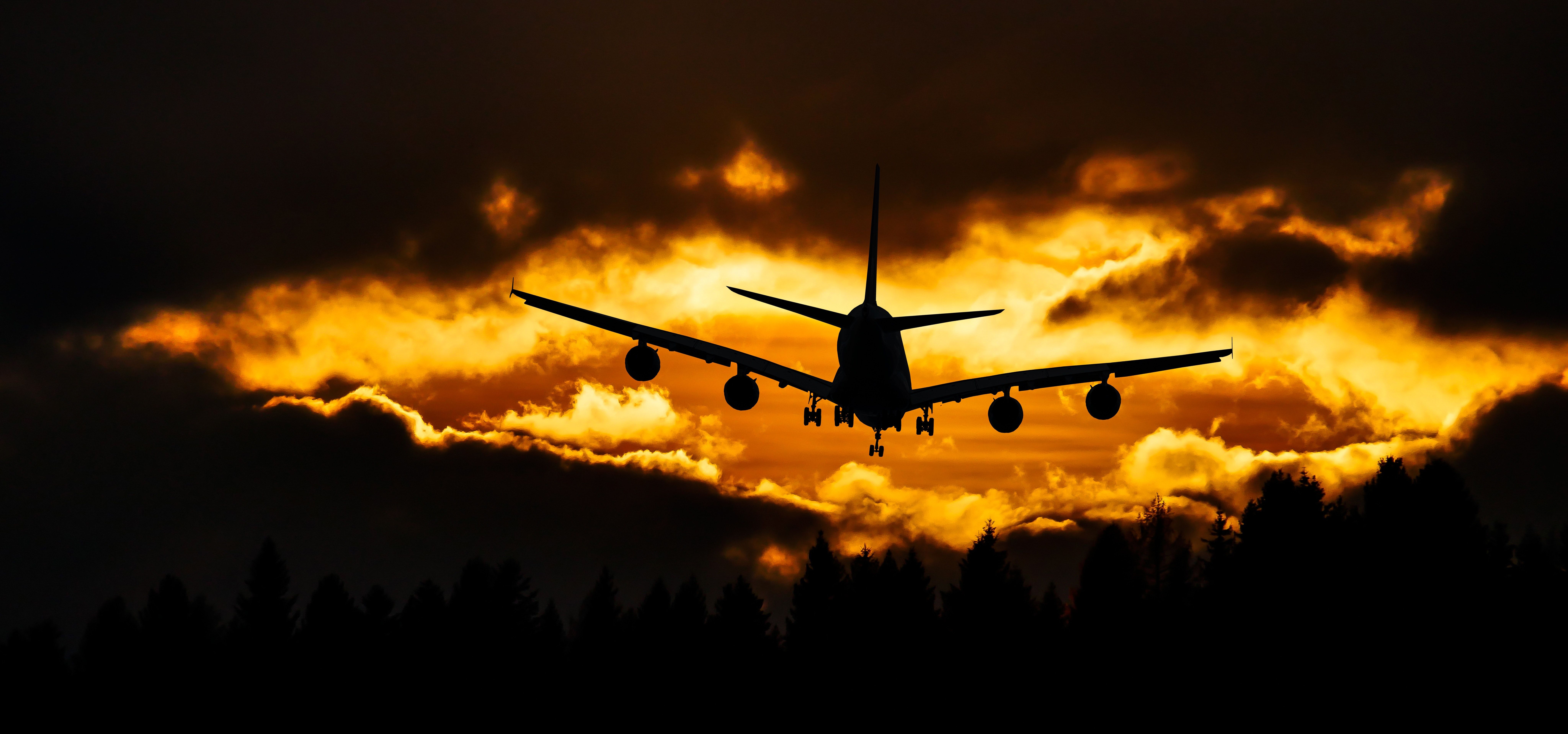 Airplane Silhouette on Air during Sunset · Free