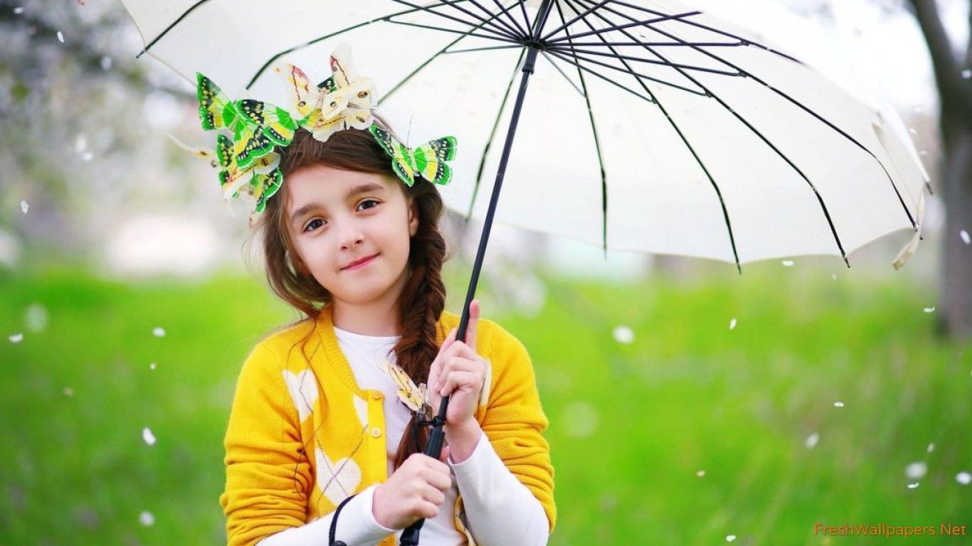 Cute baby girl with umbrella wallpaper