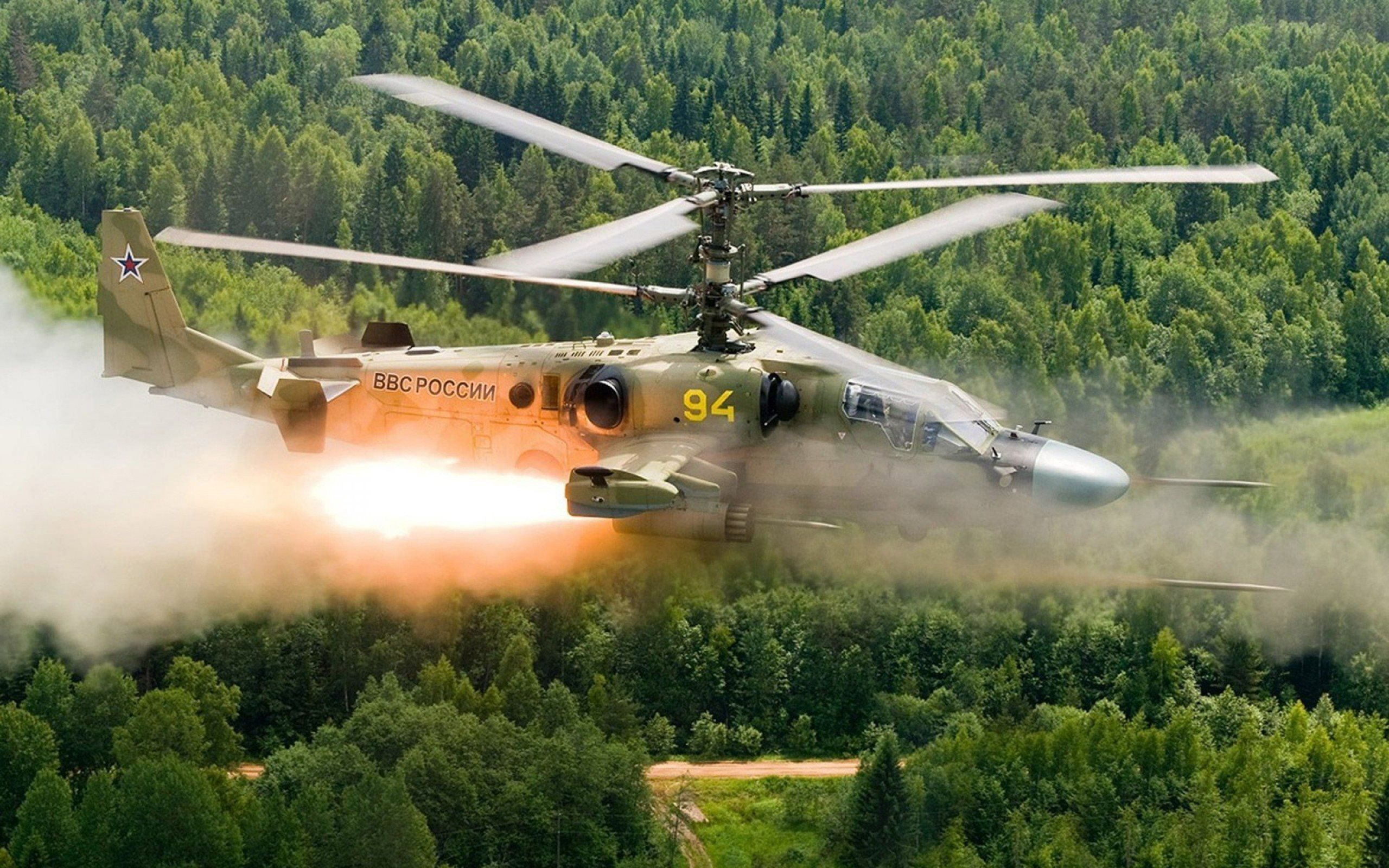 Nice photo of attack helicopter firing missiles