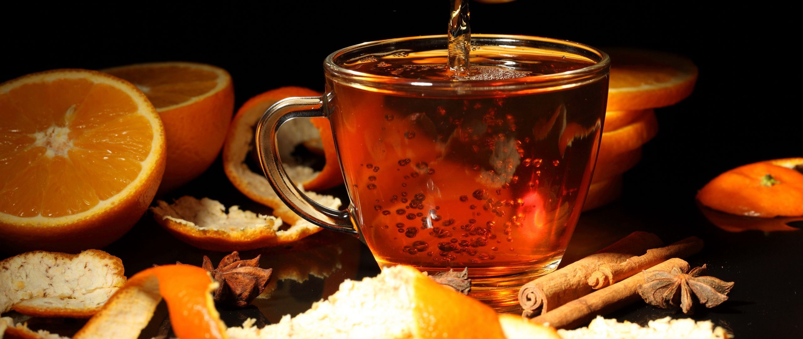 Download wallpaper 2560x1080 black background, tea, tea leaves, orange dual wide 1080p HD background