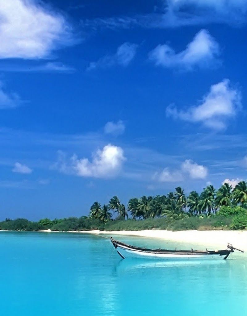 Android Best Wallpaper: Small Boat On The Blue Sea Android Best Wallpaper