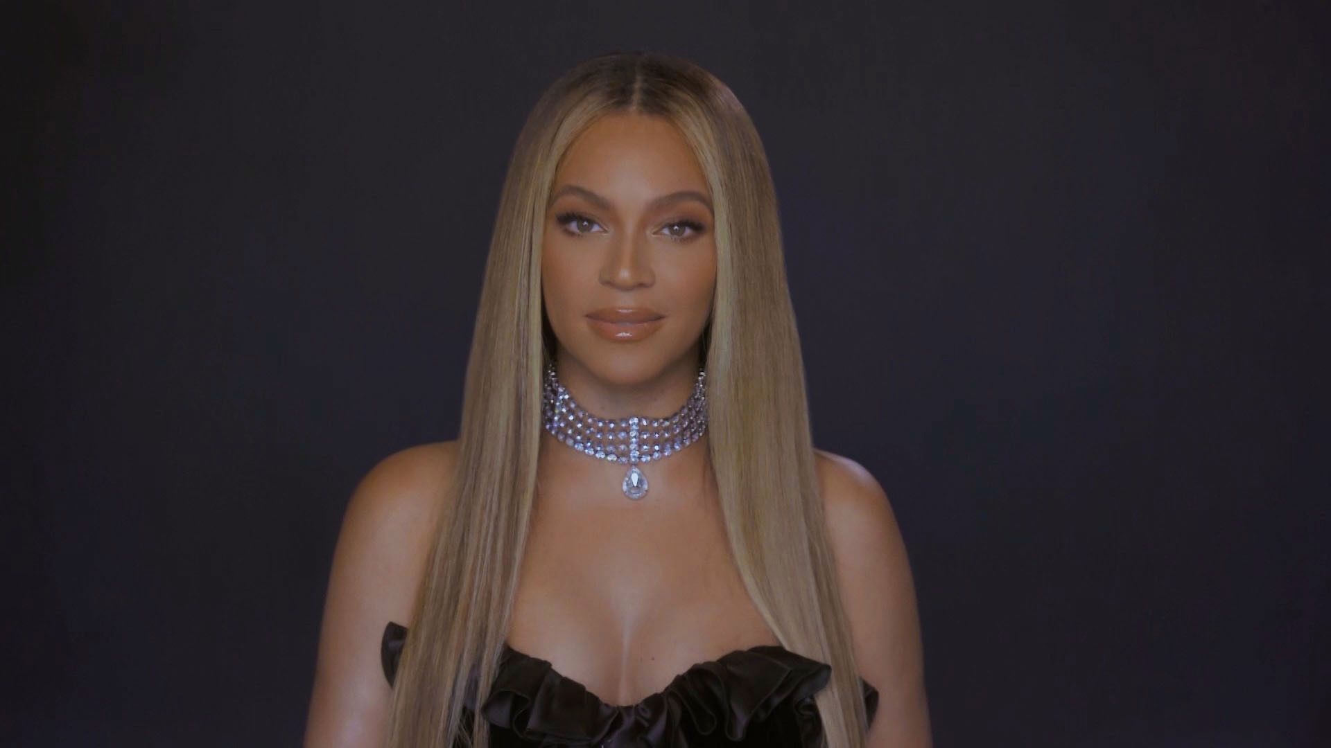 Beyoncé Wears Sheer Houndstooth Print Catsuit