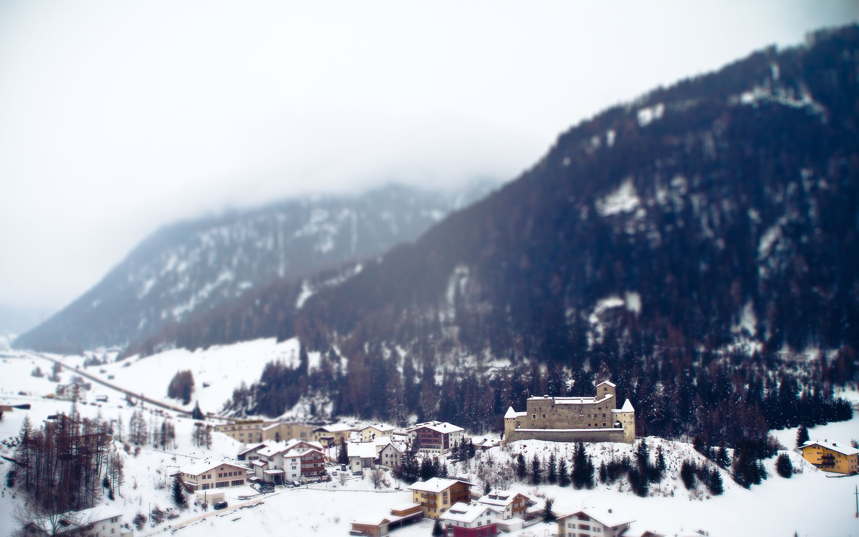 Download Wallpaper 2880x1800 City, Resort, Mountains, Alps, Snow, Winter, Tilt Shift HD Background