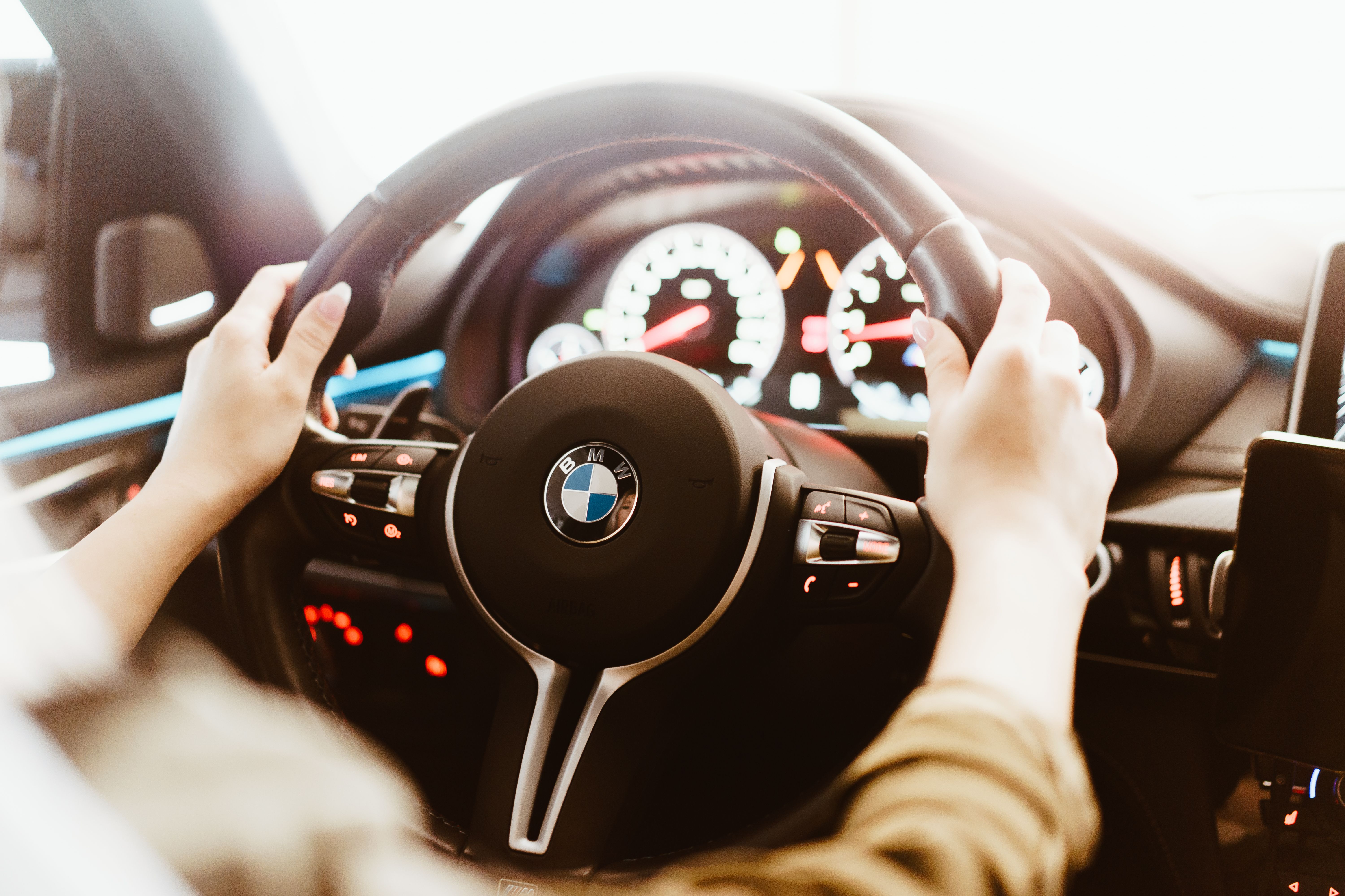 Woman Driving a BMW Luxury Car Free