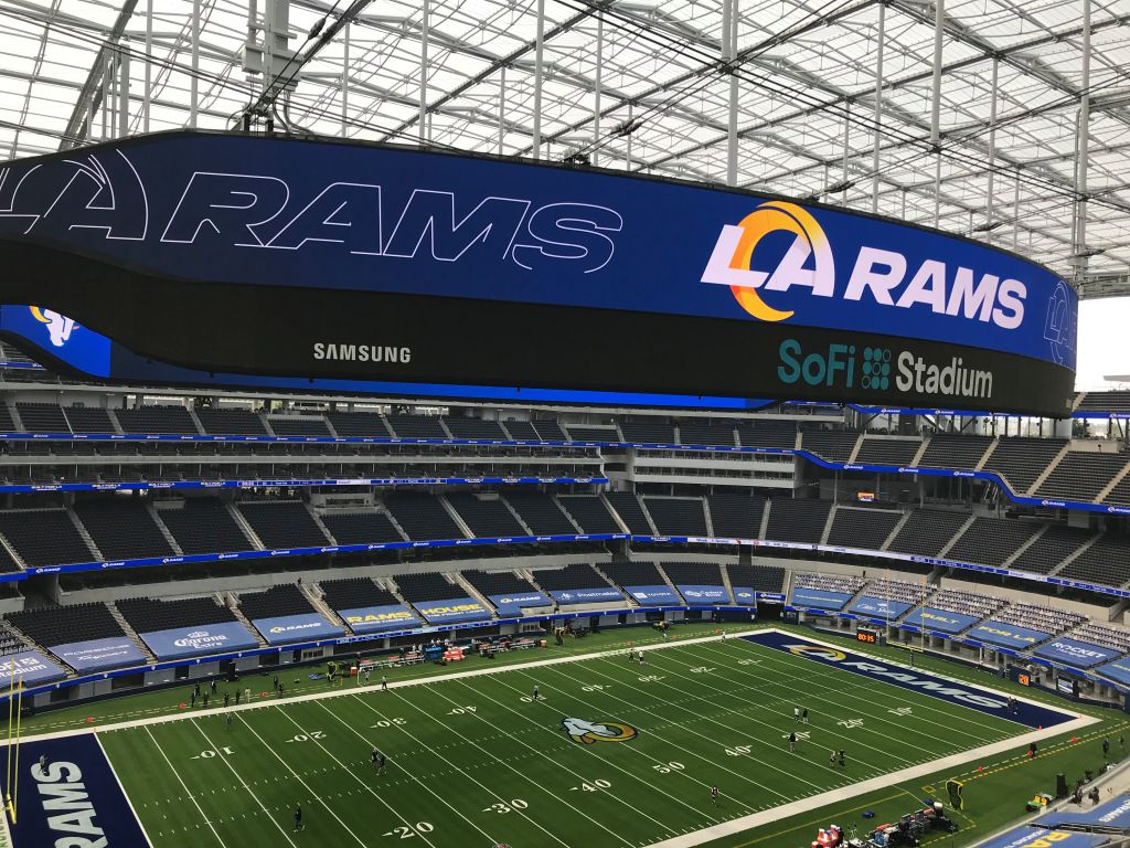 An empty SoFi Stadium hosts first LA Rams game, and a resurgent Inglewood has hope