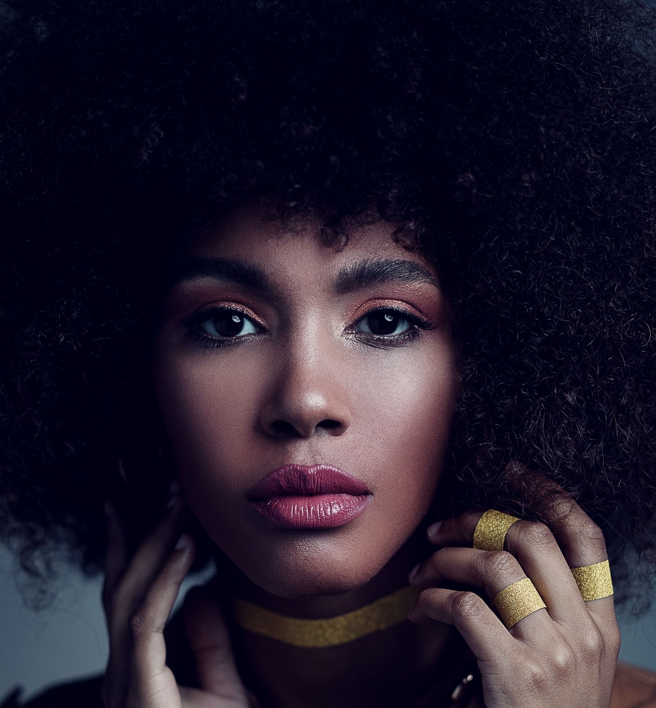 Gorgeous young black woman with Afro hair · Free