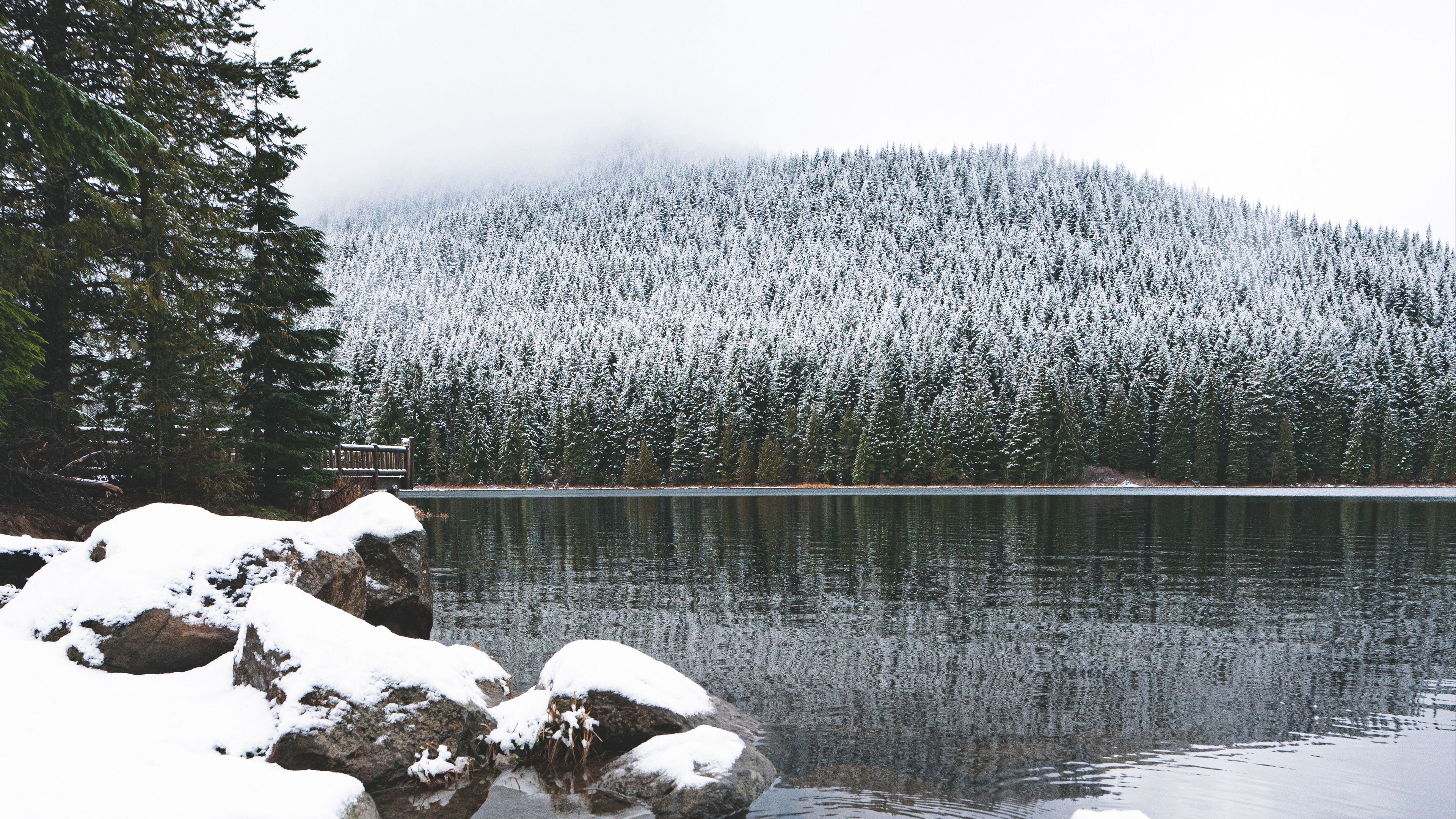 Download wallpaper 3840x2160 lake, stones, snow, forest, winter, landscape 4k uhd 16:9 HD background
