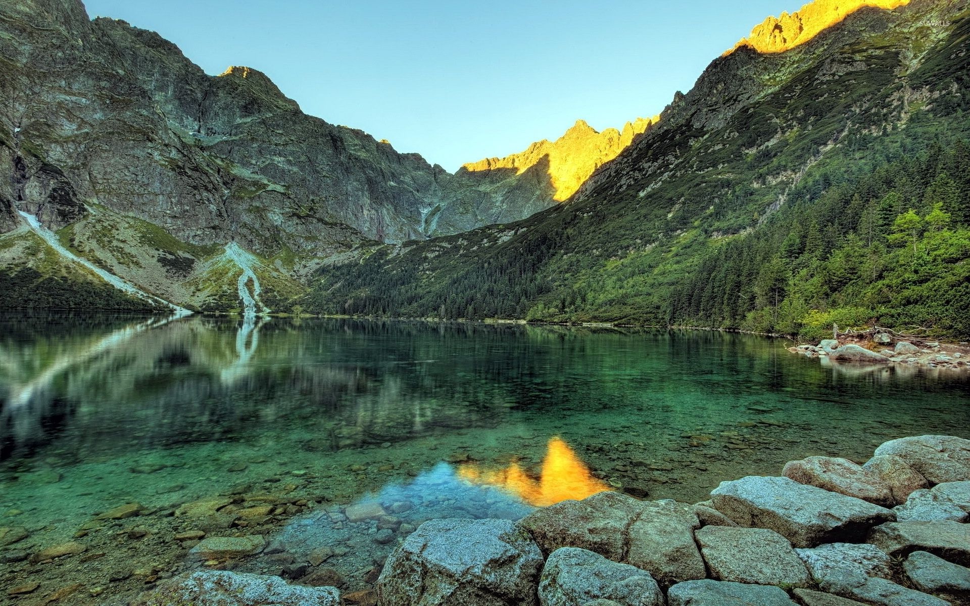 Rocky lake by the forest mountain wallpaper wallpaper