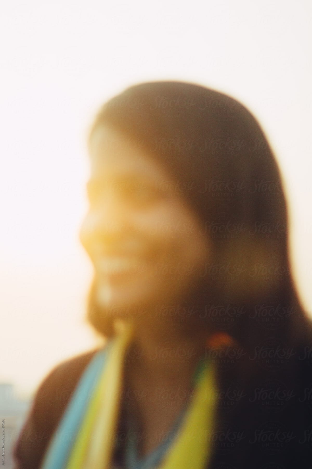 blurry portrait of happy woman