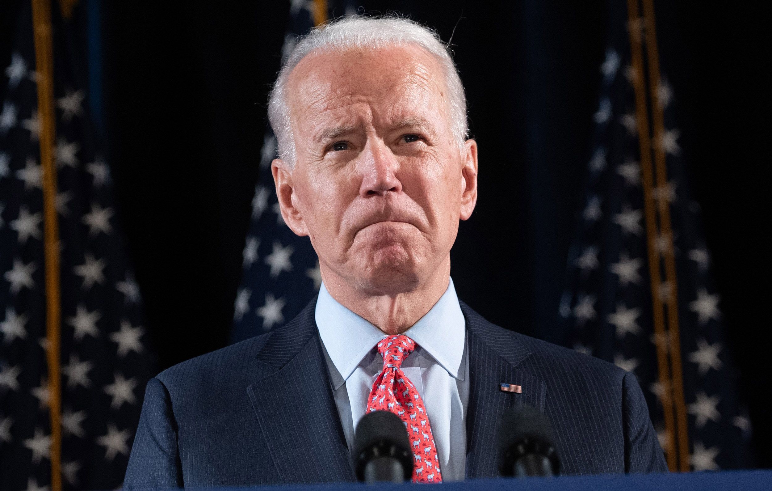 Biden denies he's 'hiding, ' defends staying off campaign trail in person