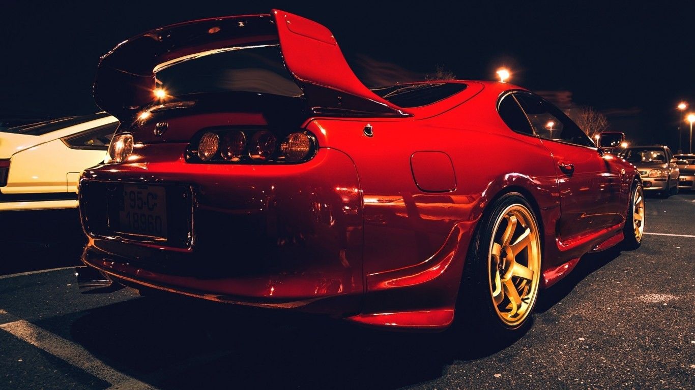 Download 1366x768 Toyota Supra, Red, Back View, Sport, Cars Wallpaper for Laptop, Notebook