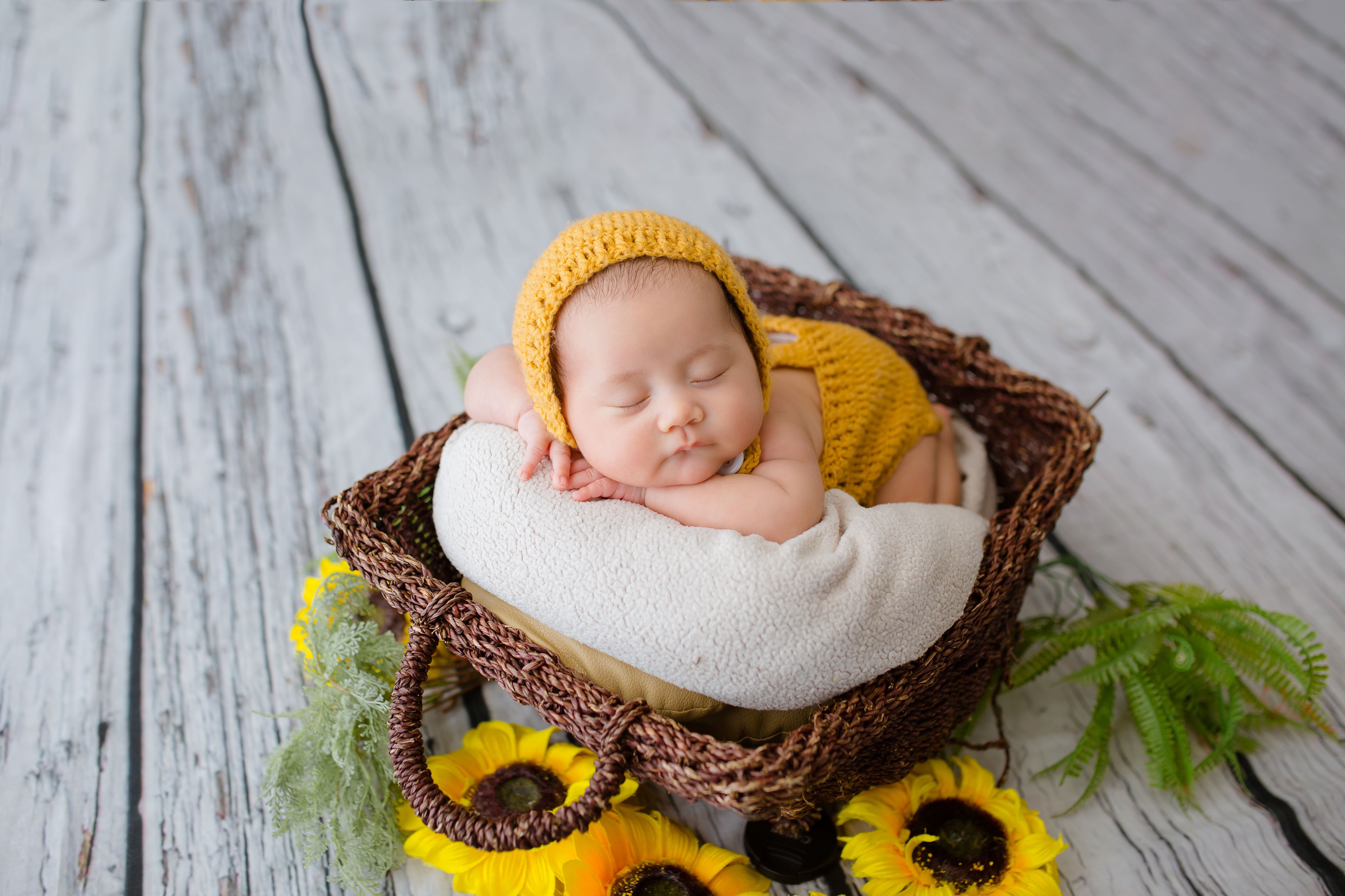 Newborn 4K Wallpaper, Crochet baby costume, Yellow dress, Sleeping baby, Basket, Sunflowers, Cute