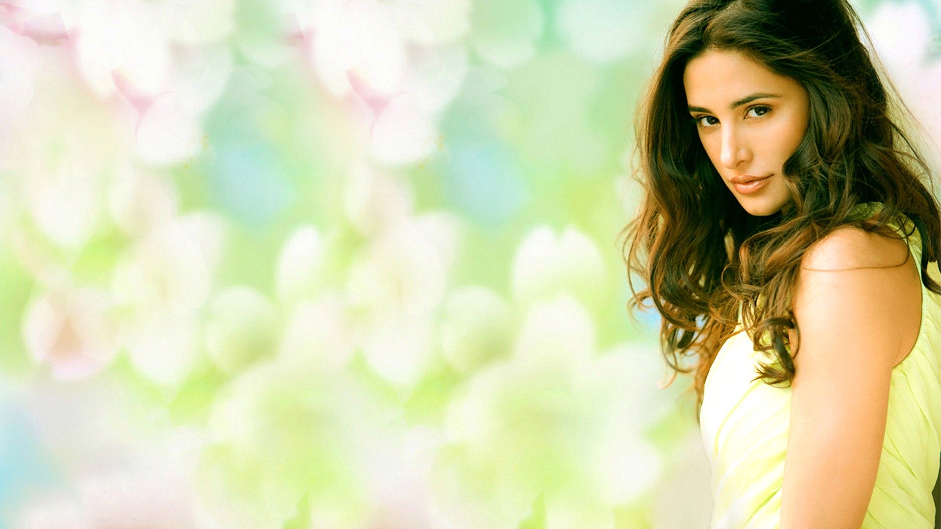 Beautiful New Famous Bollywood Actress Nargis Fakhri in Yellow Dress Wallpaper