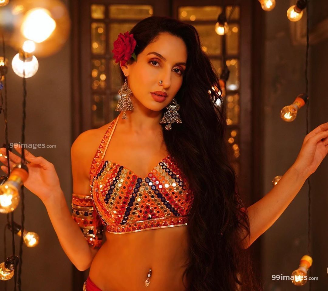 Nora Fatehi Latest Hot HD Photo & Mobile Wallpaper (1080p) # norafatehi #actress #model #dancer #singer. Nora lovely, Bollywood actress hot, Bollywood