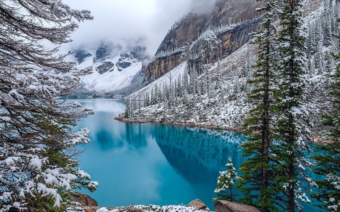 Wonderful blue mountain lake in the winter season