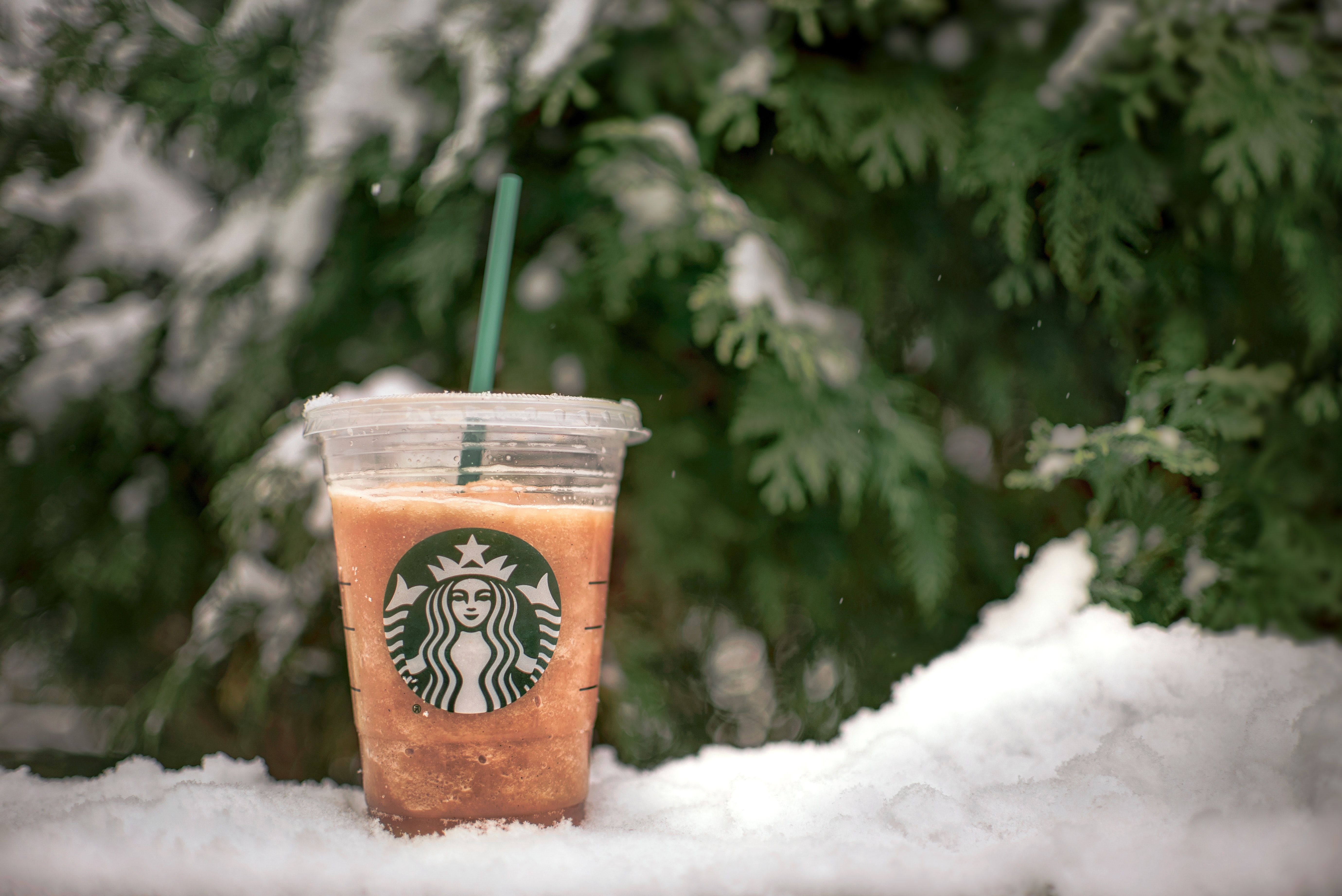 Close Up Photo Of Starbucks Beverage · Free