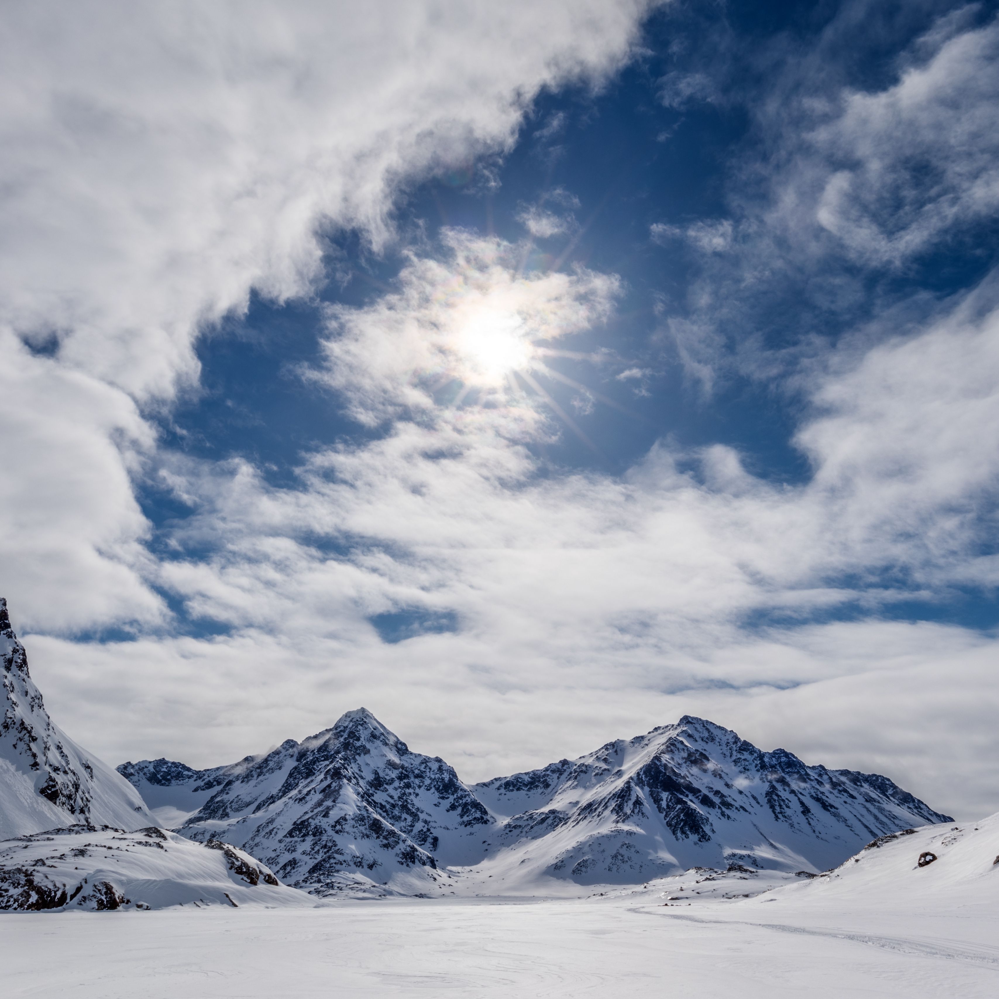 Download wallpapers 3415x3415 mountains, snow, winter, clouds, sky, rays, sun ipad pro 12.9 retina for parallax hd backgrounds