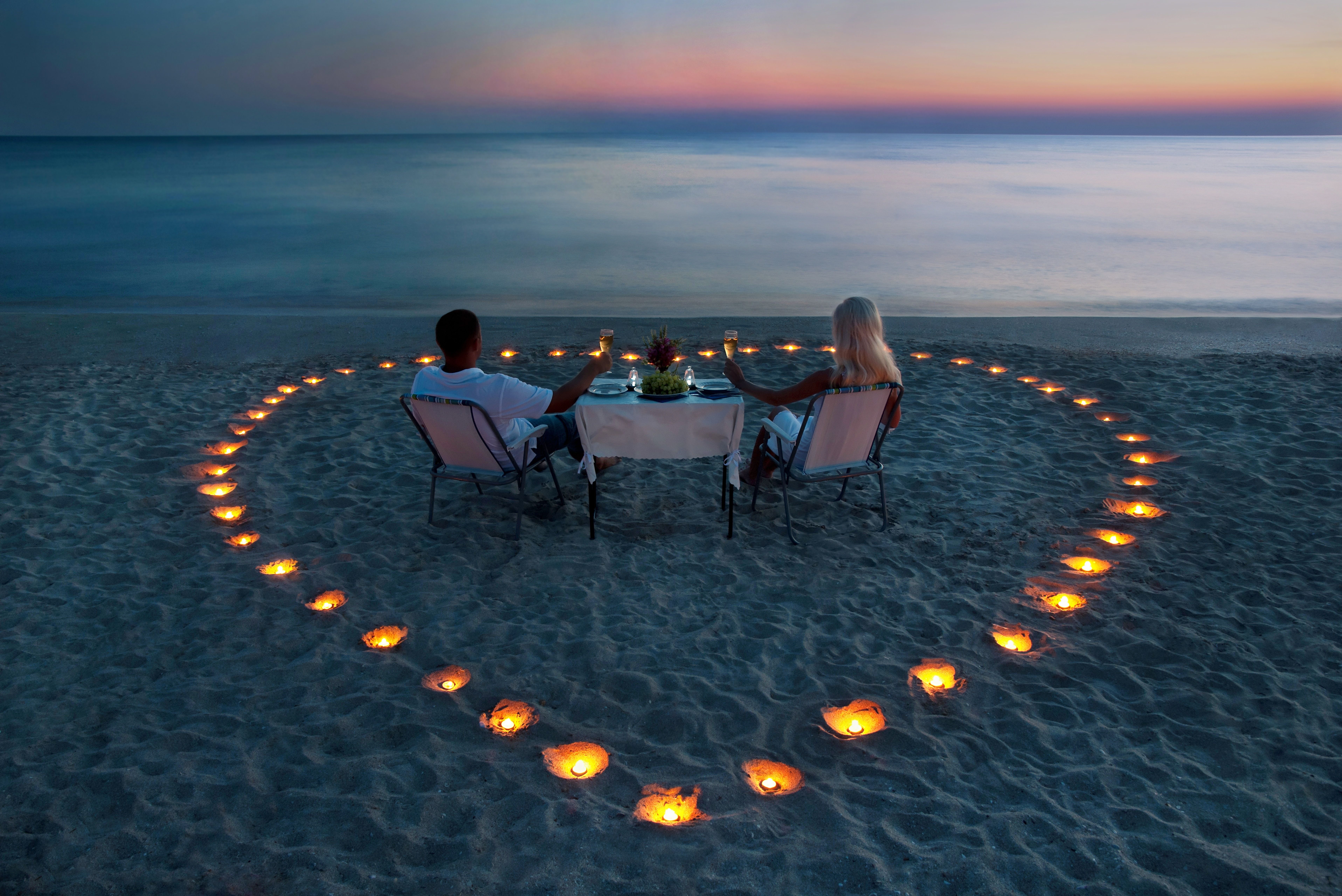 A romantic dinner on the beach desktop wallpaper