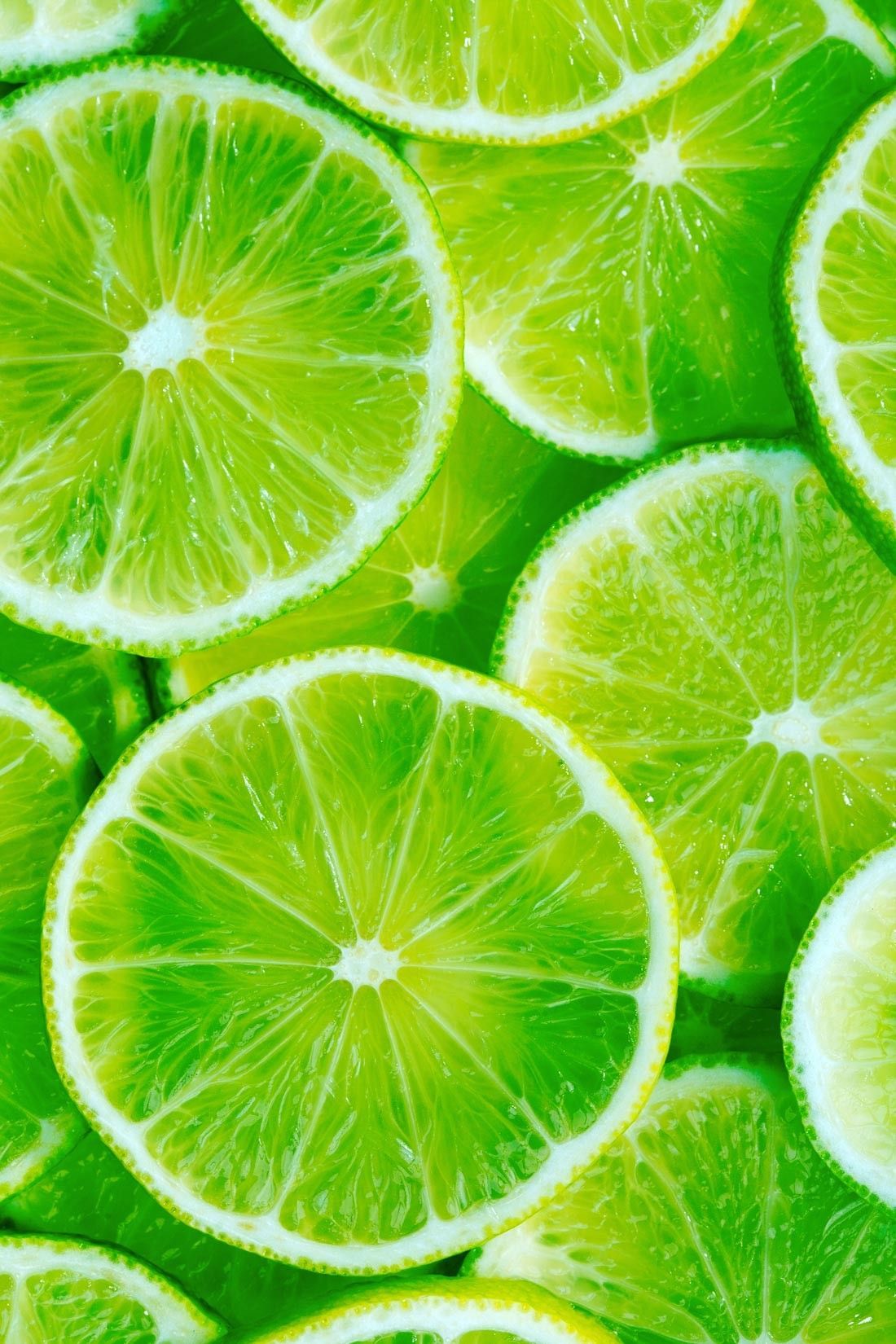 Lime Slices Wall Mural: Edibles: Fruits: These vibrant lime slices will add a pop of color or highlight to any. Green aesthetic, Green picture, Fruit photography