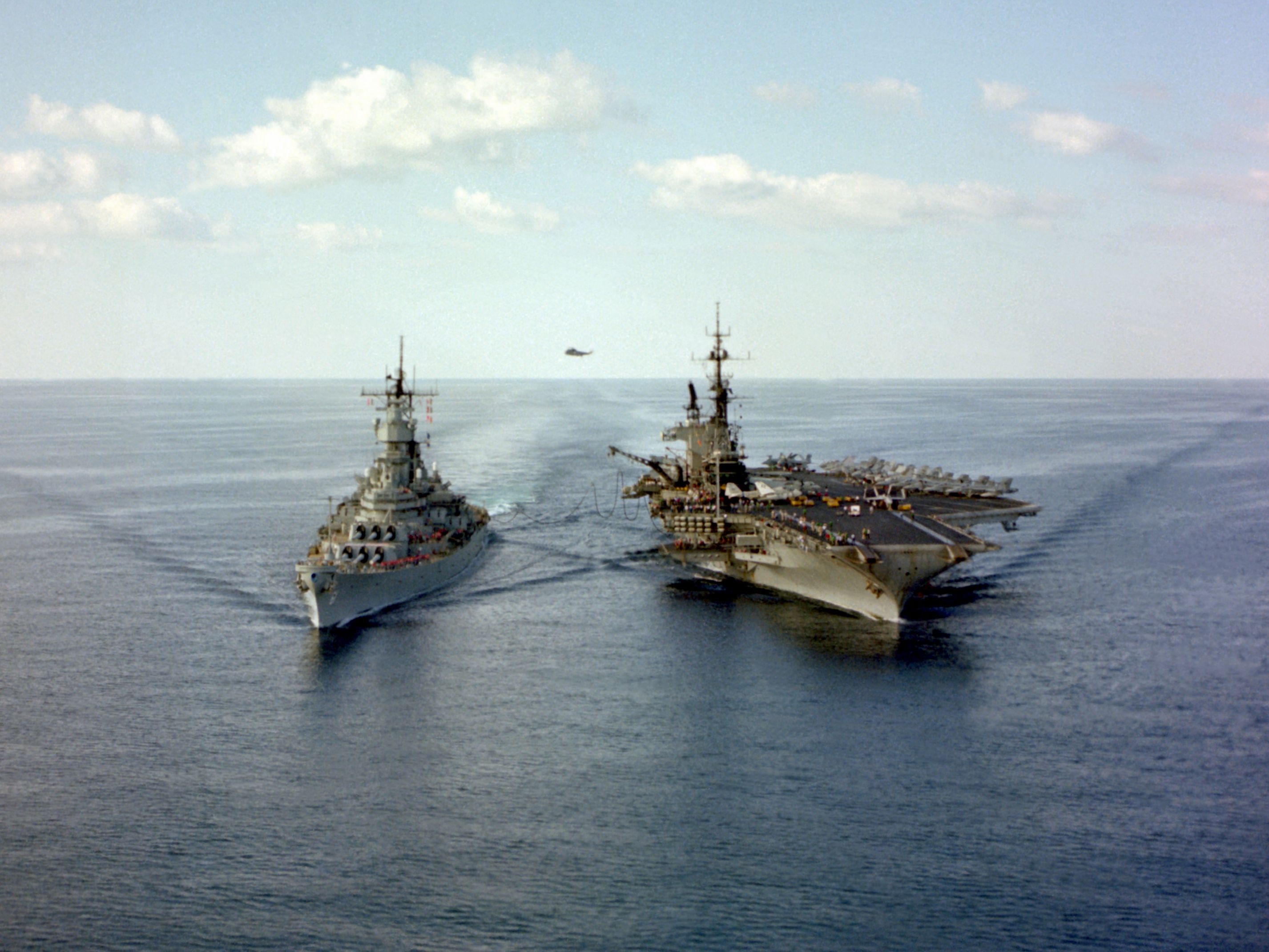 USS Iowa conducts an UNREP with USS .reddit.com