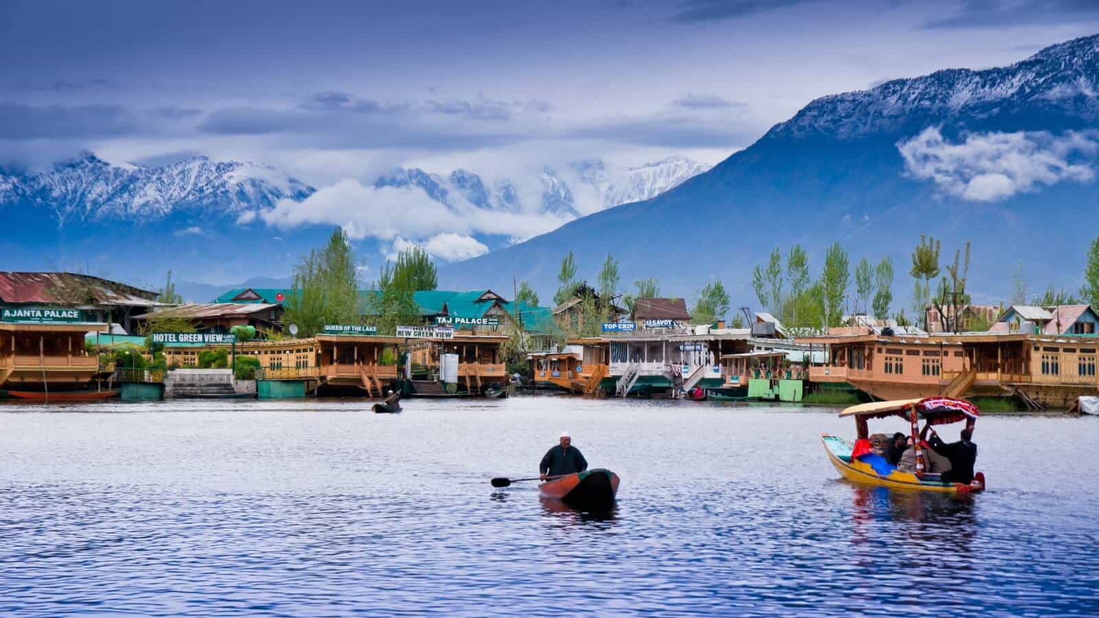 Aerial View of a Waterfront Houses at the Dal Lake Shore · Free Stock Photo