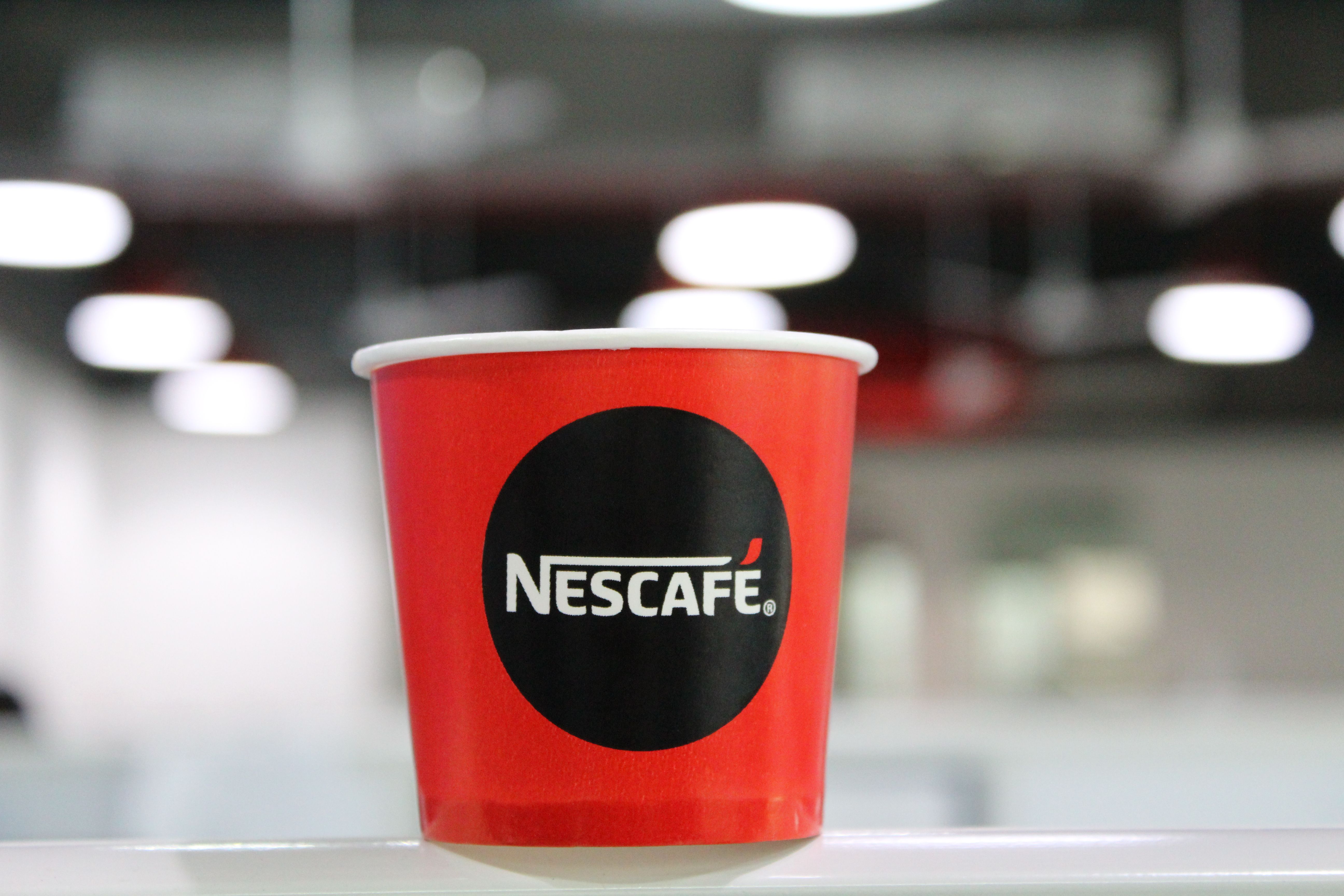 Red And Black Nescafe Coffee Cup · Free .pexels.com