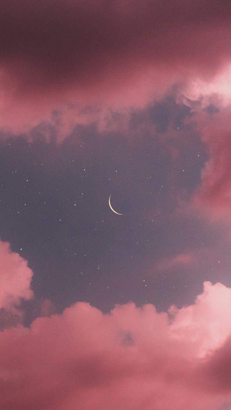 Crescent moon in the pink sky .com