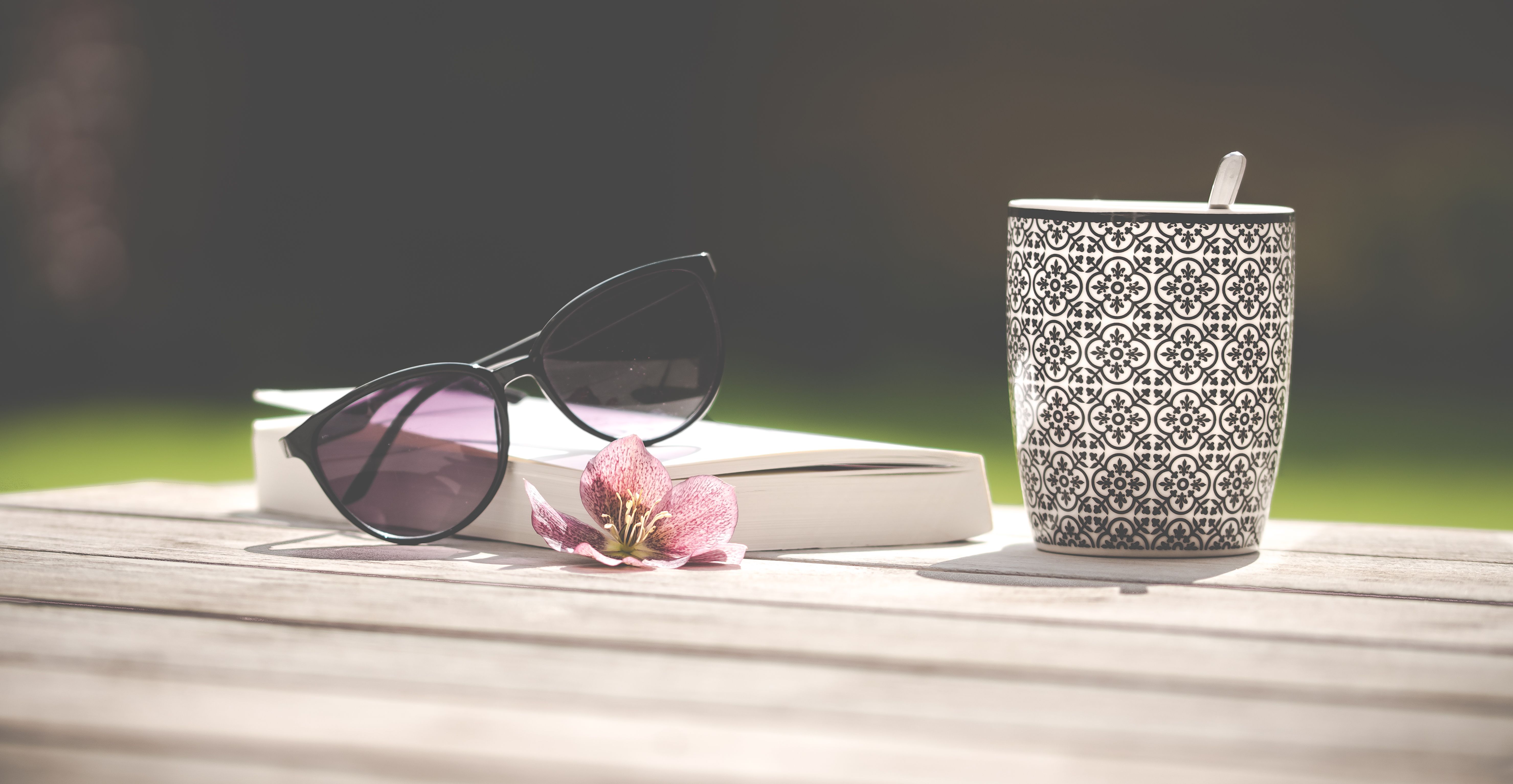 Black Sunglasses Beside Ceramic Mug .pexels.com