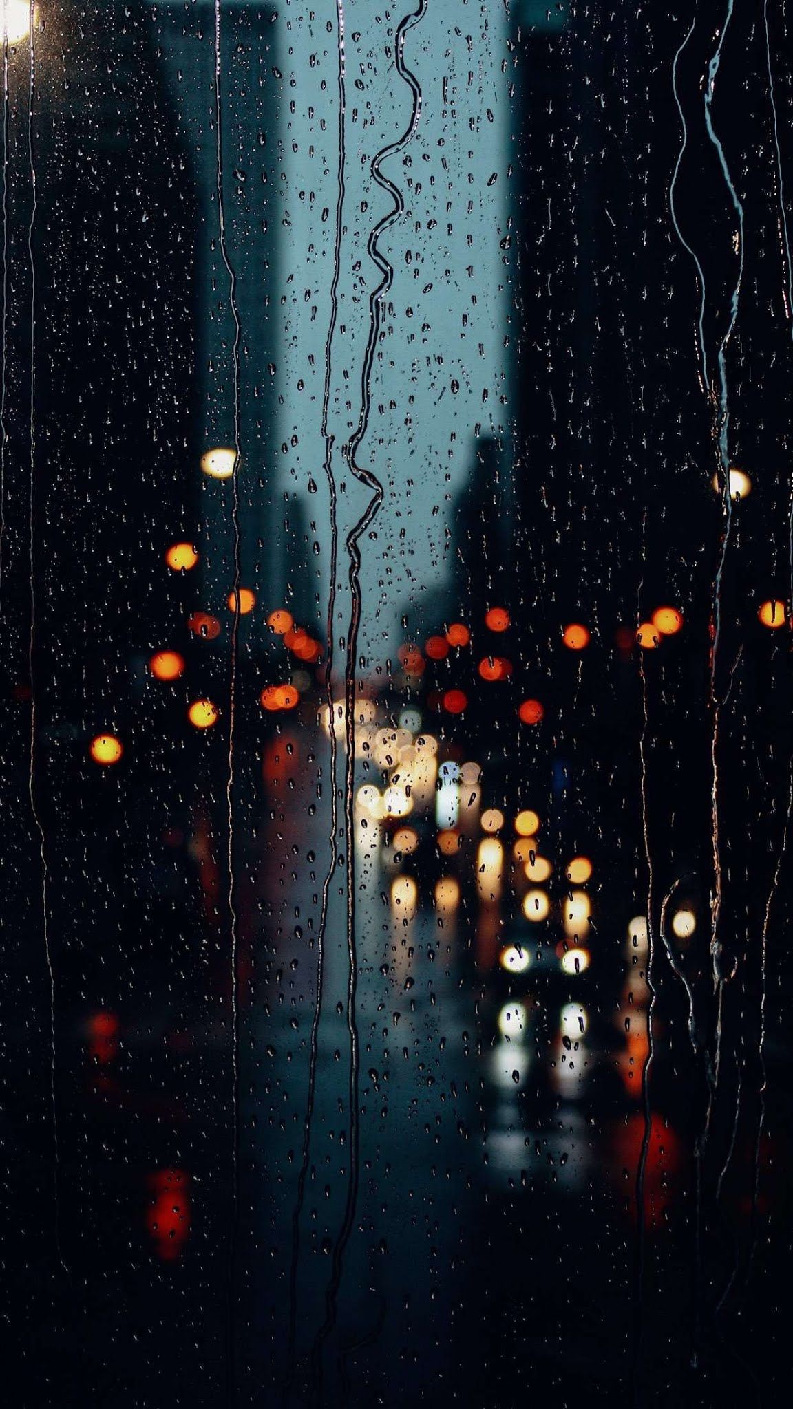 Rain drops on window glass mobile wallpaper Mobile Walls