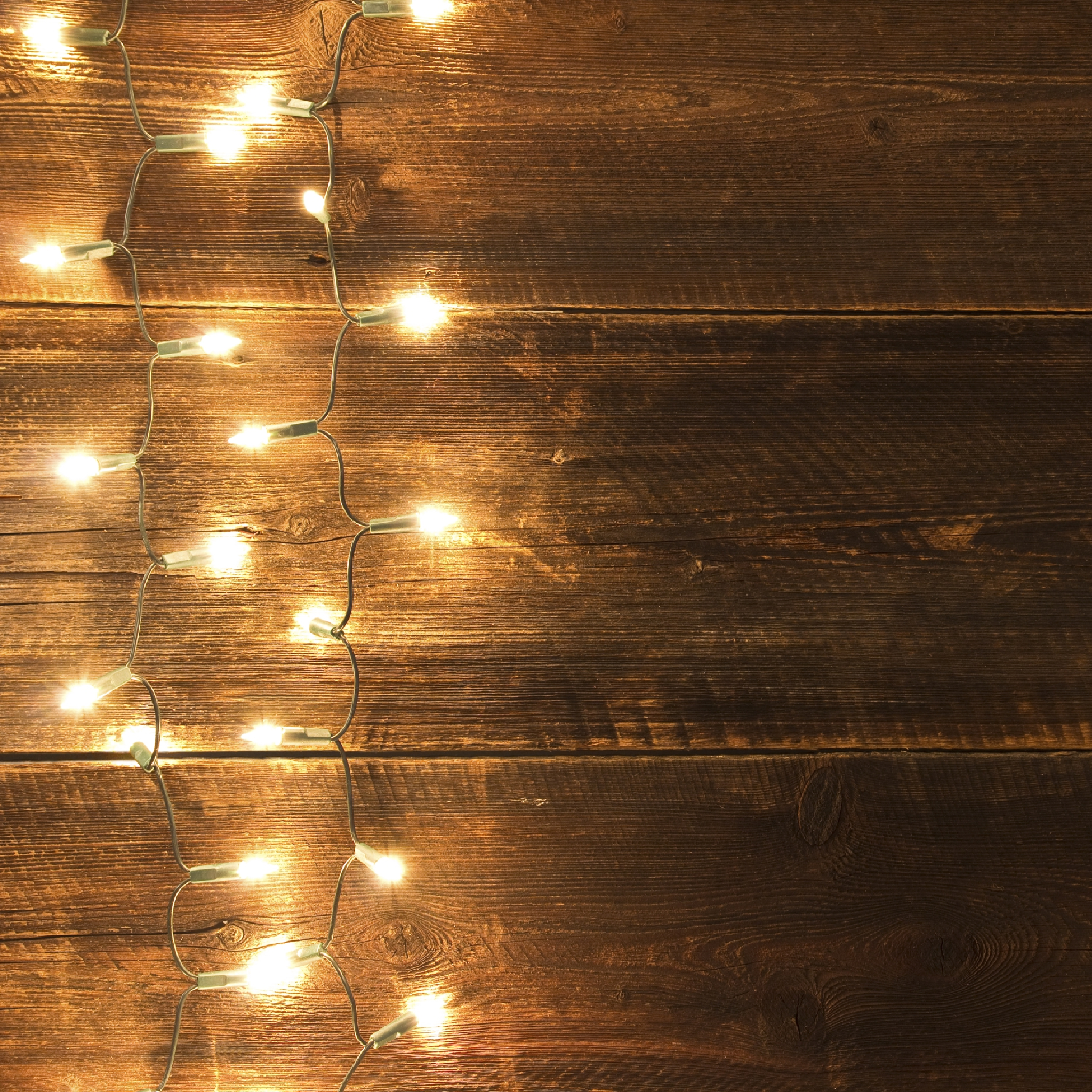 Lights On Wooden Wall.