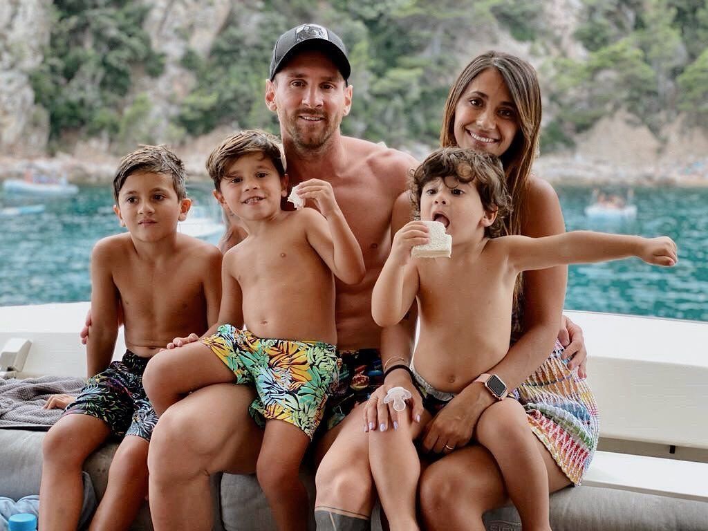 Topless Lionel Messi relaxes with wife Antonella and three kids on Ibiza holiday as he ponders Barcelona transfer exit