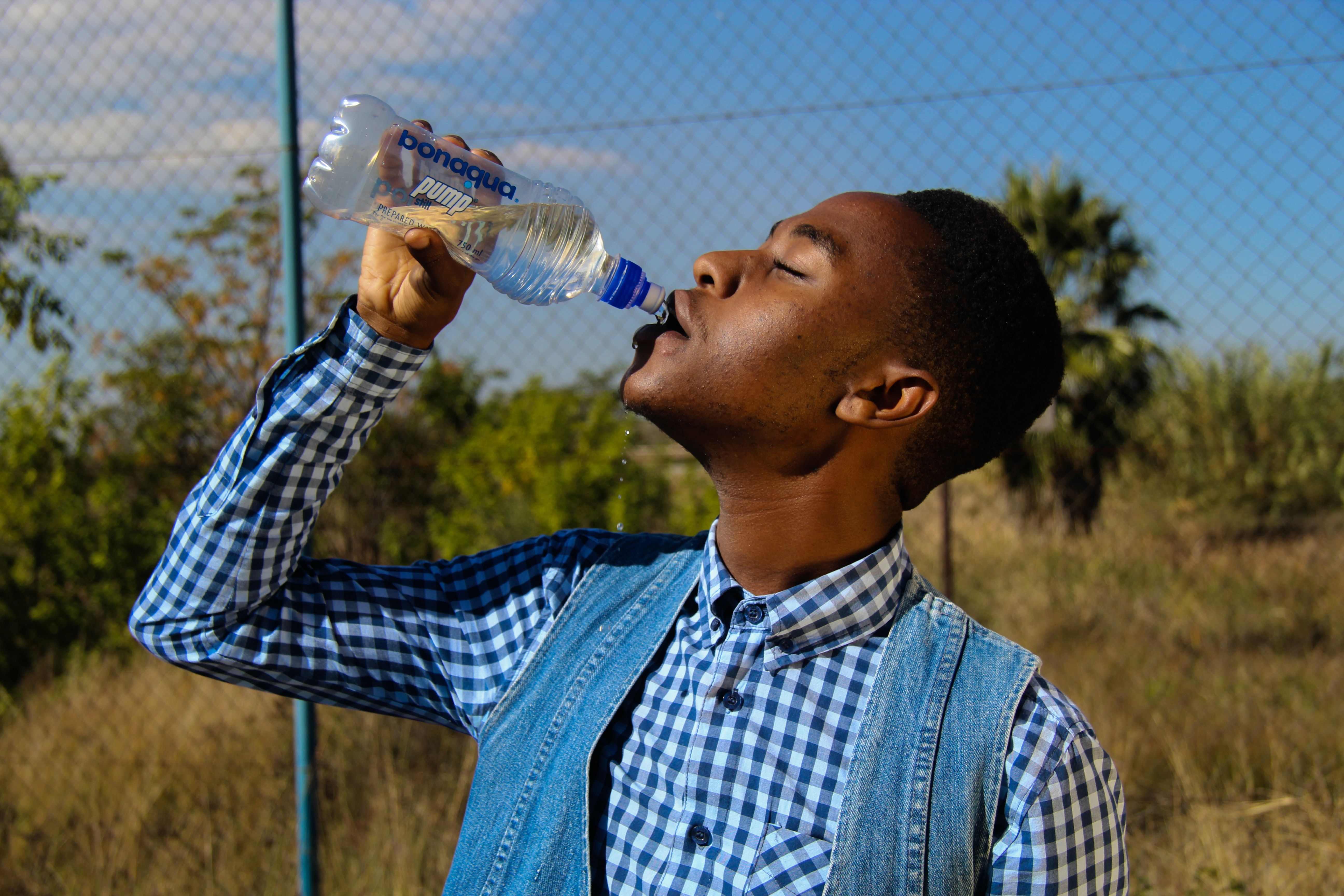 Photography of A Man Drinking Water · Free