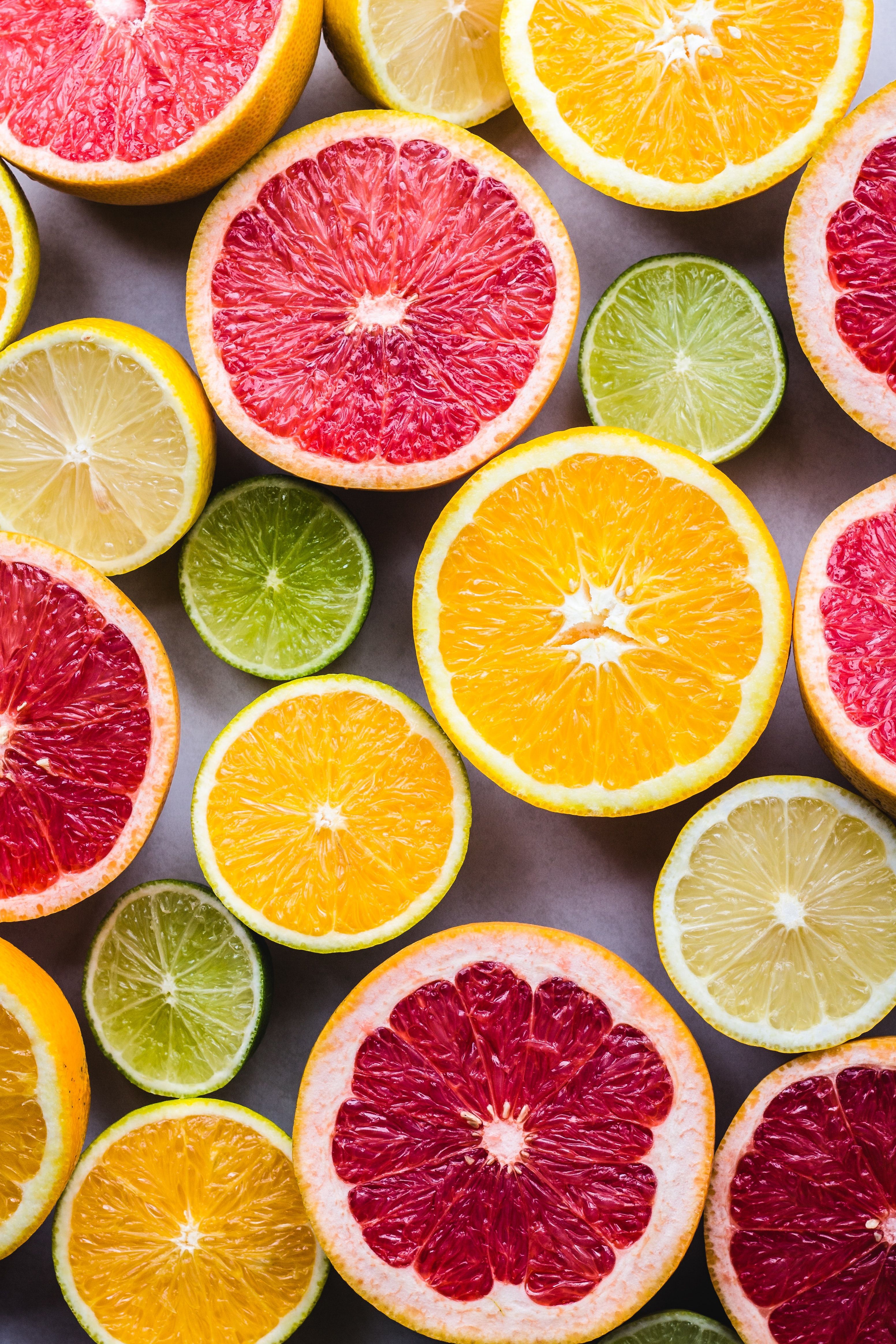 food #fruit #citrus fruit #flat #lay #photography flat lay photography of sliced pomegranate, lime, and lemon Oranges. Citrus fruit, Fruit, Fruit photography