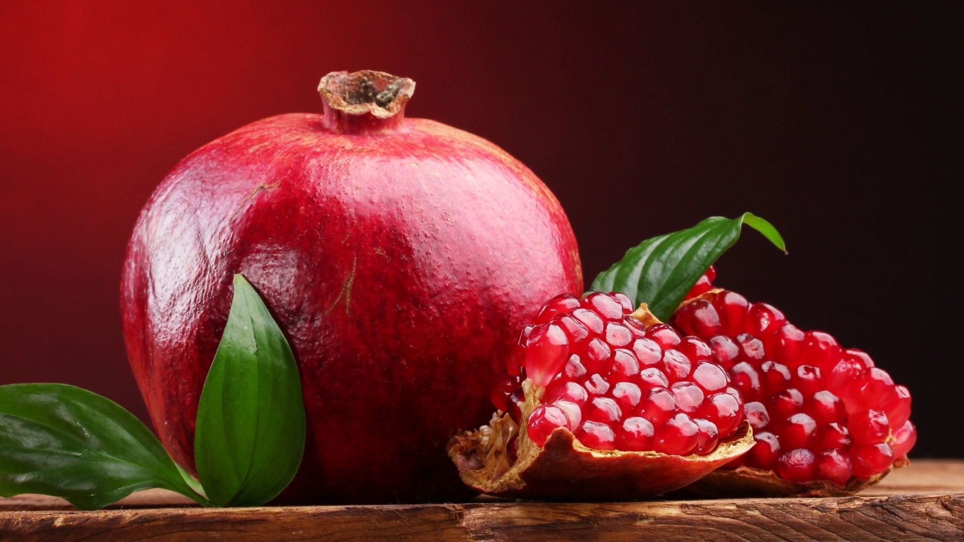 Download Fresh Three Pomegranate Fruits Wallpaper  Wallpaperscom