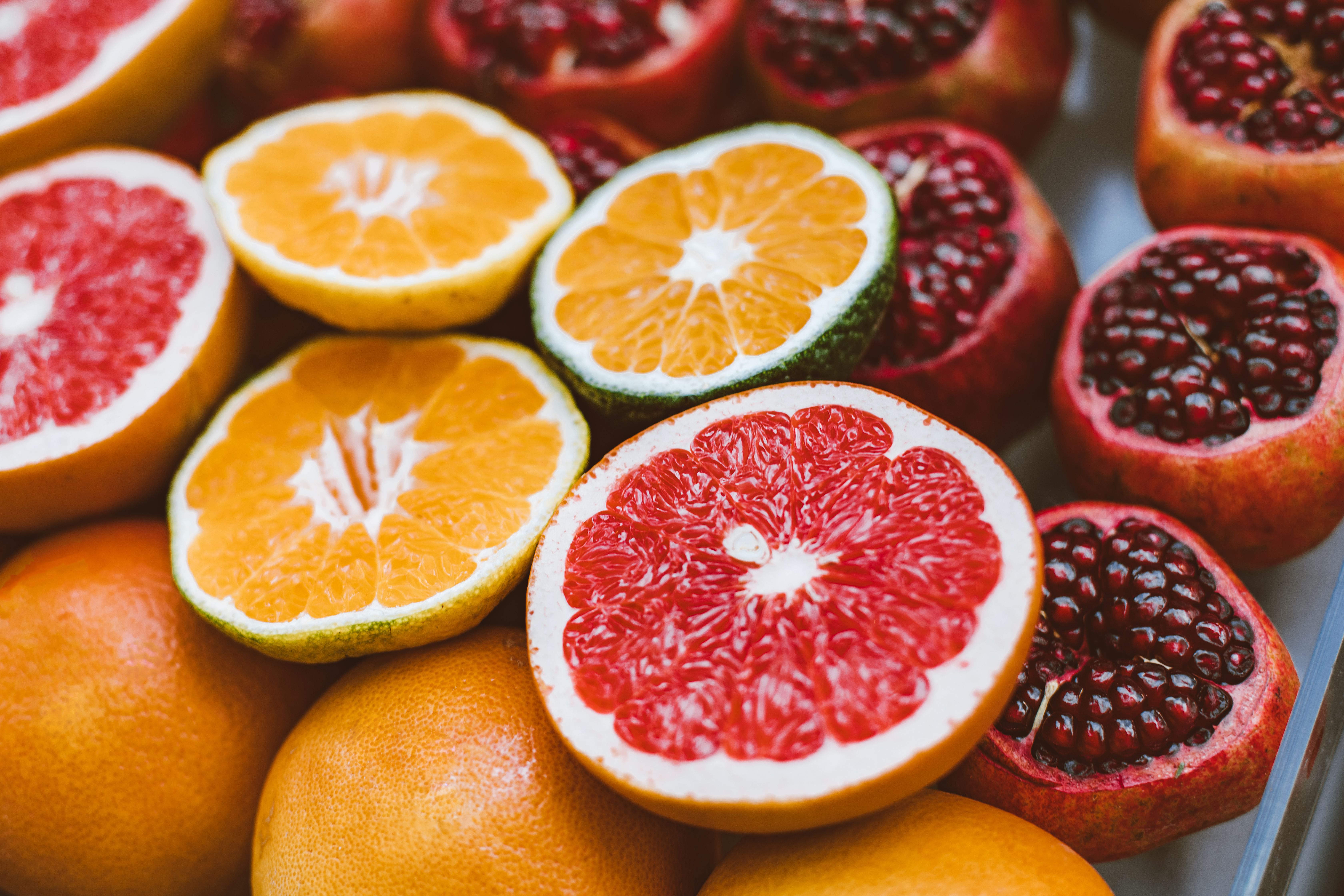 Sliced Orange Fruit and Pomegranate Fruits · Free